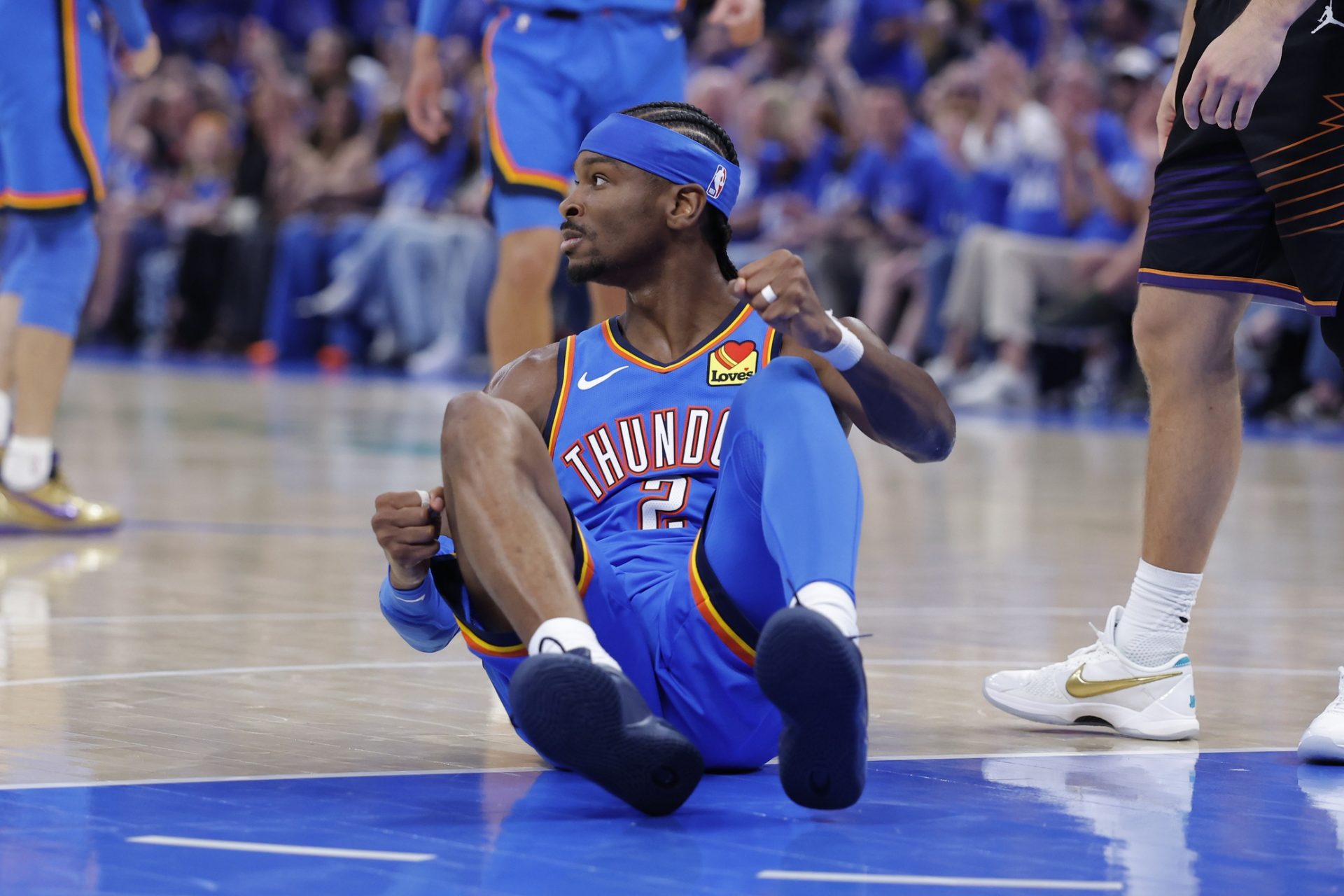 Oklahoma City Thunder guard Shai Gilgeous-Alexander (2) reacts after a play against the Phoenix Suns. - Source: Imagn