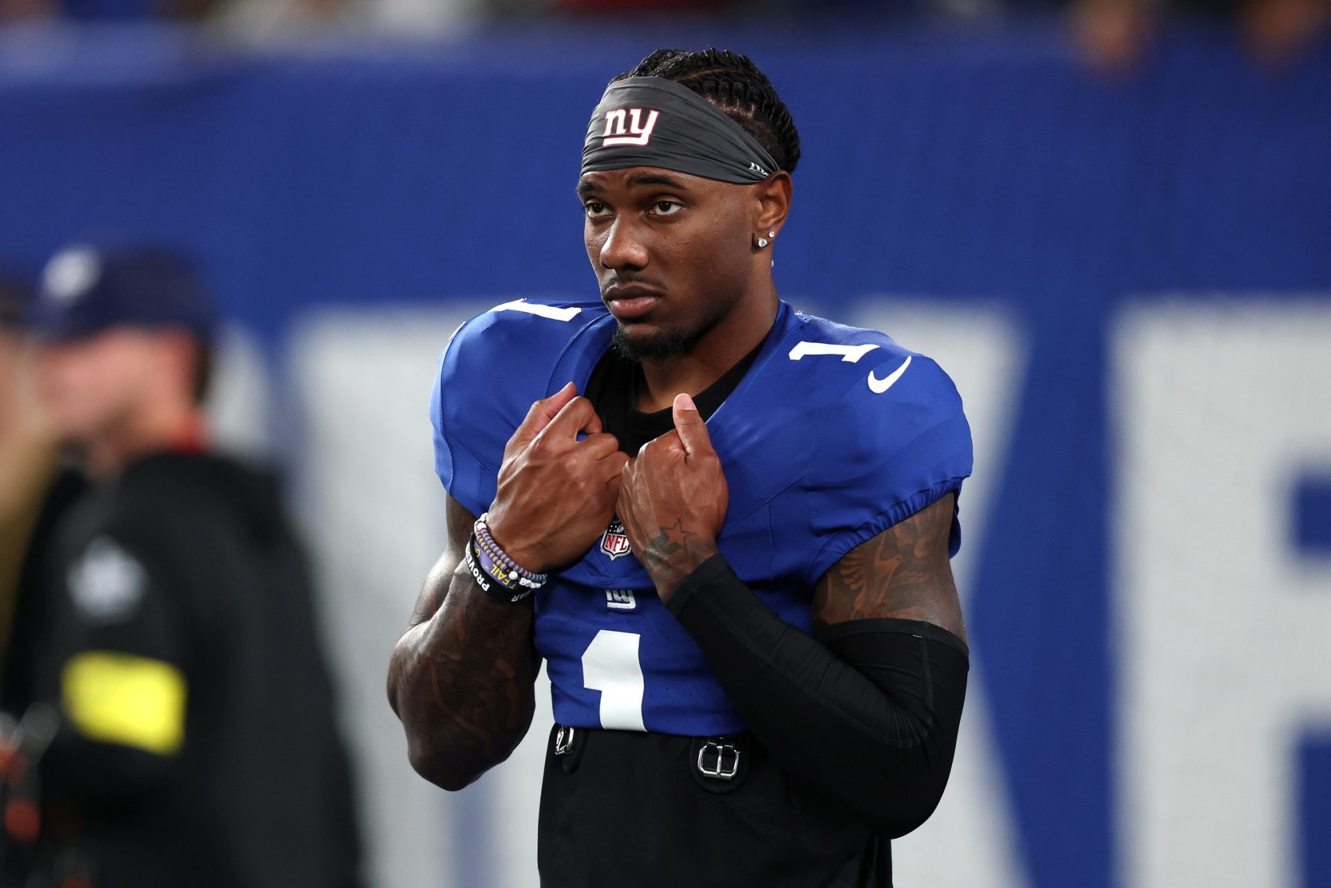New York Giants wide receiver Malik Nabers (1) looks on before the game against the Kansas City Chiefs at MetLife Stadium.
