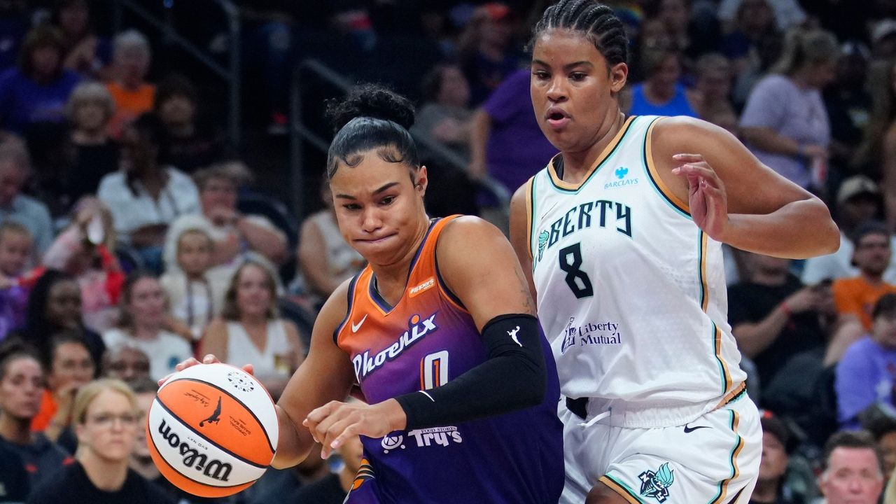 Mercury forward Satou Sabally (8) drives to the basket on Liberty forward Nyara Sabally (8) during a game at PHX Arena in Phoenix, on June 27, 2025 - Source: Imagn Images