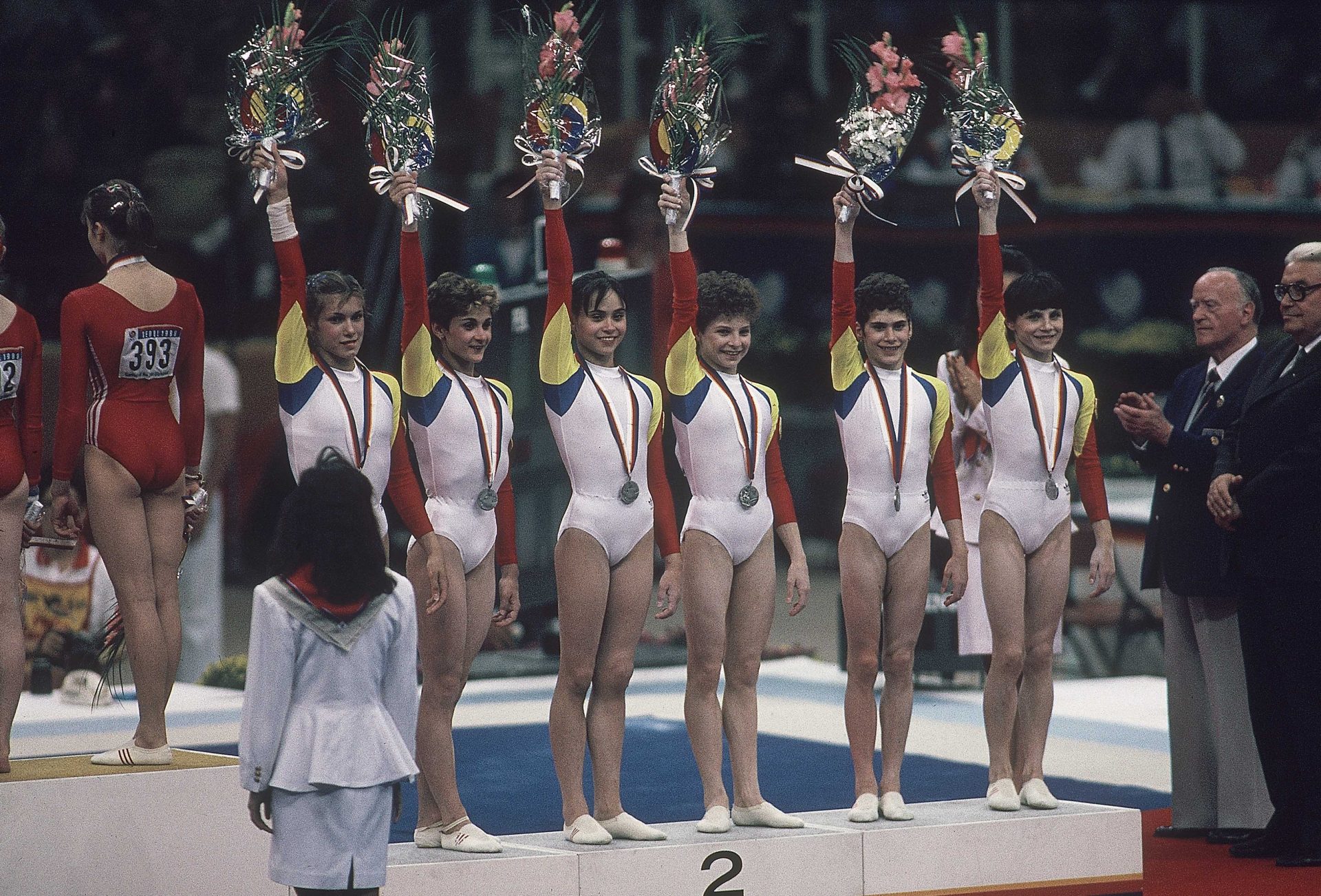FILE PHOTO; (left to right) Eugenia Golea, Camelia Voinea, Aurelia Dobre, Daniela Silivas, Celestina Popa and Gabriela Potorac of Romania on the podium after placing second in the women's gymnastics team all around during the 1988 Seoul Olympic Games at Olympic Gymnastics Hall.