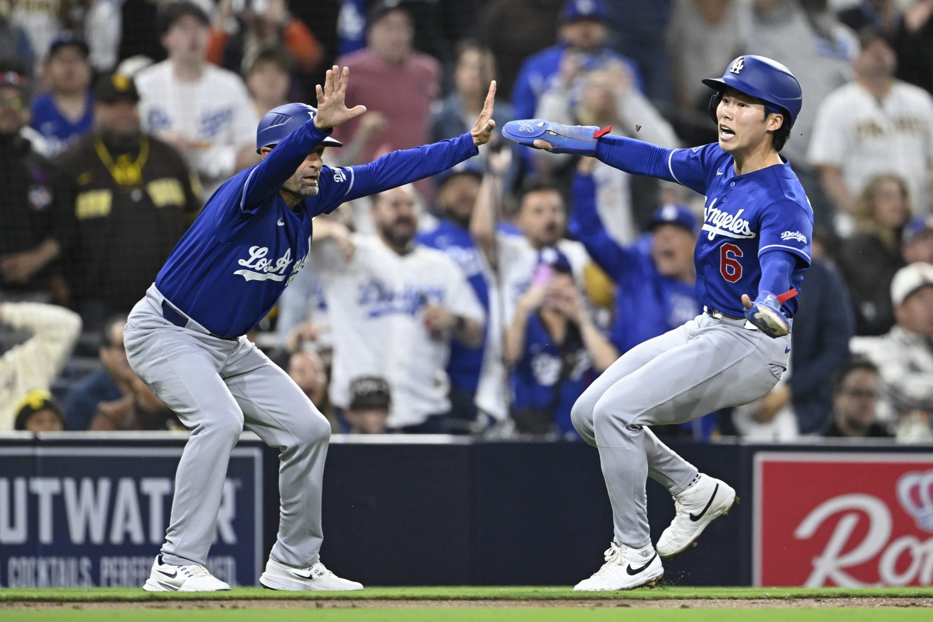 Dino Ebel and Hyeseong Kim - Dodgers vs. Padres | Source: Imagn