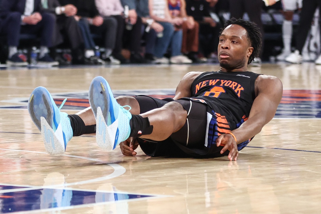 New York Knicks forward Og Anunoby (8) falls to the court after missing a shot against the Philadelphia 76ers during game five of the second round of the 2026 NBA Playoffs at Madison Square Garden.
