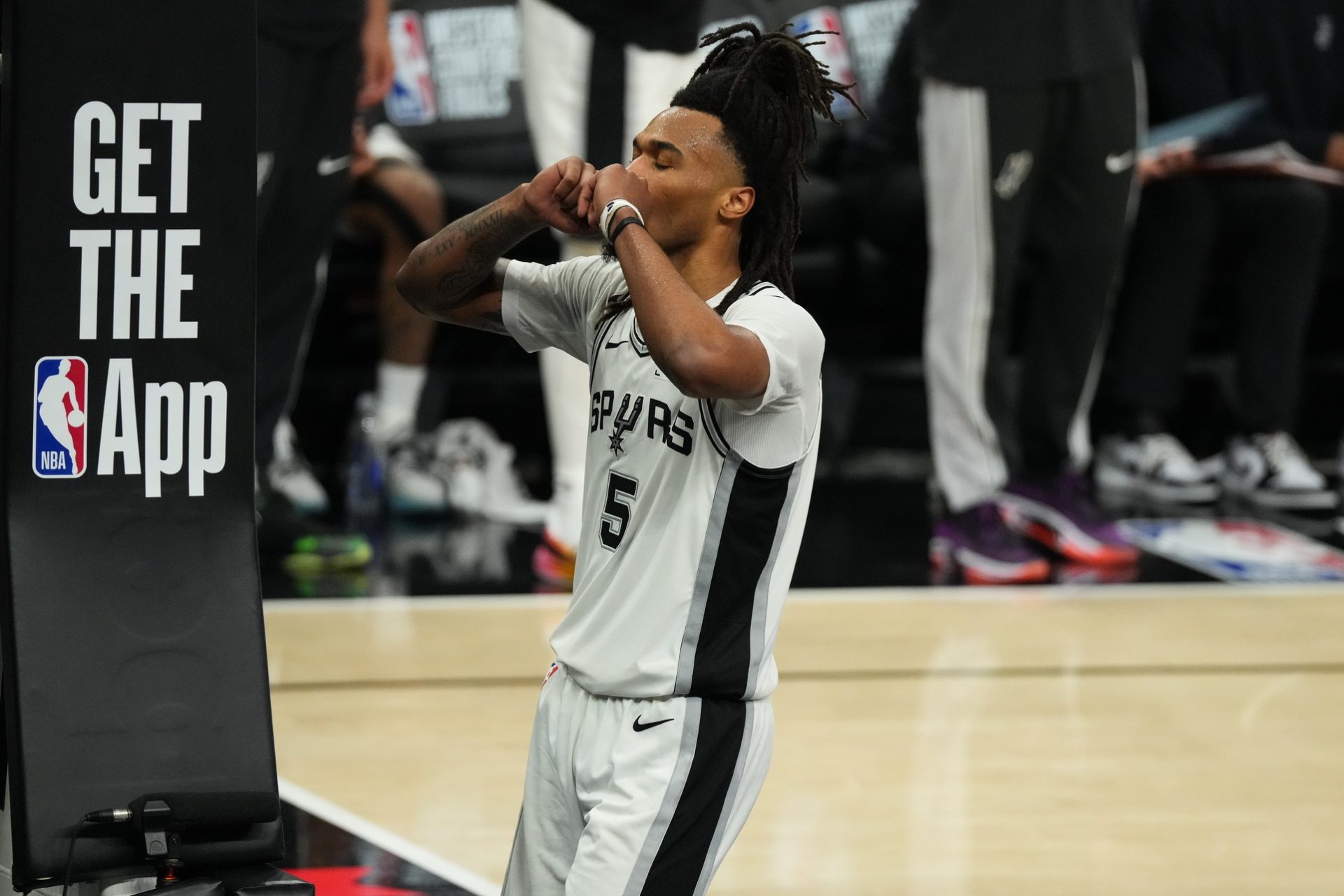 San Antonio Spurs guard Stephon Castle (5) reacts in the third quarter against the Oklahoma City Thunder during game four of the western conference finals for the 2026 NBA playoffs at Frost Bank Center.