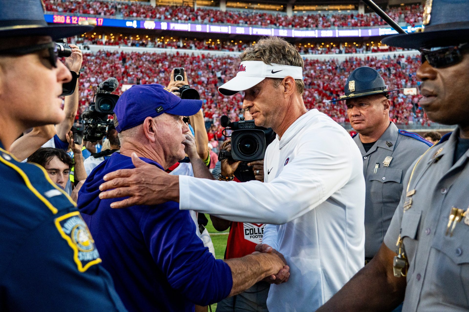 LSU head coach Brian Kelly and Ole Miss head coach Lane Kiffin shake hands after a college football game between Ole Miss and LSU at Vaught-Hemingway Stadium in Oxford, Miss., on Saturday, Sept. 27, 2025. Ole Miss defeated LSU 24-19.