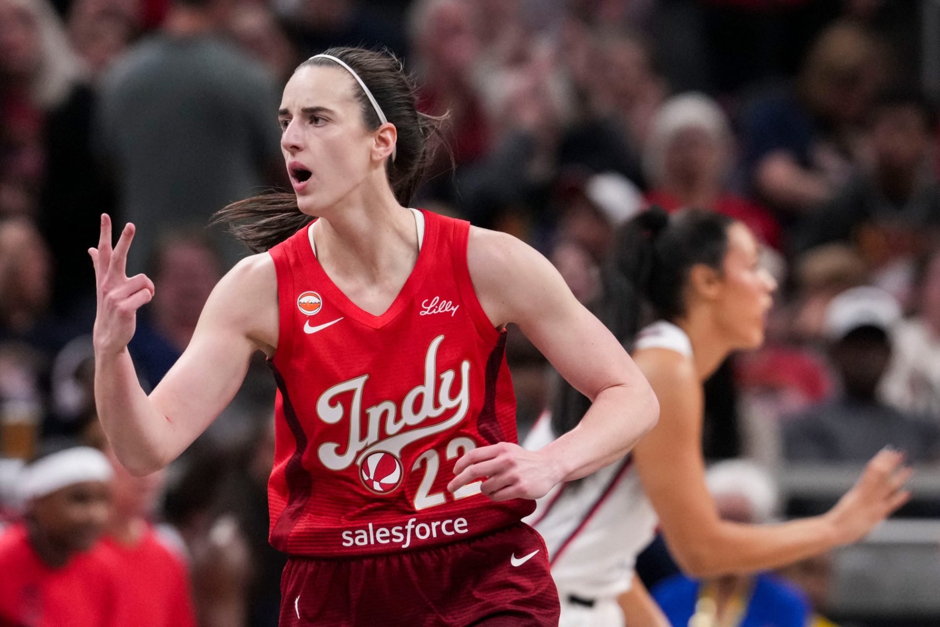 Indiana Fever guard Caitlin Clark (22) celebrates a 3-pointer Friday, May 15, 2026, during the first half of a game at Gainbridge Fieldhouse in Indianapolis.