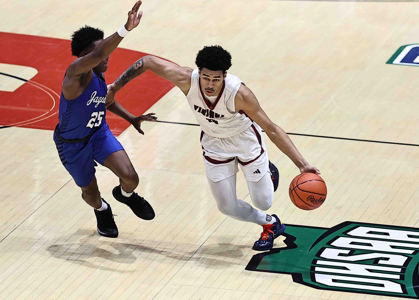 Princeton's Kam Mercer (4) drives to the basket against Hilliard Bradley's Jordan Reed-Davis during their OHSAA DI state championship game Sunday, March 22, 2026. Credits: Imagn.