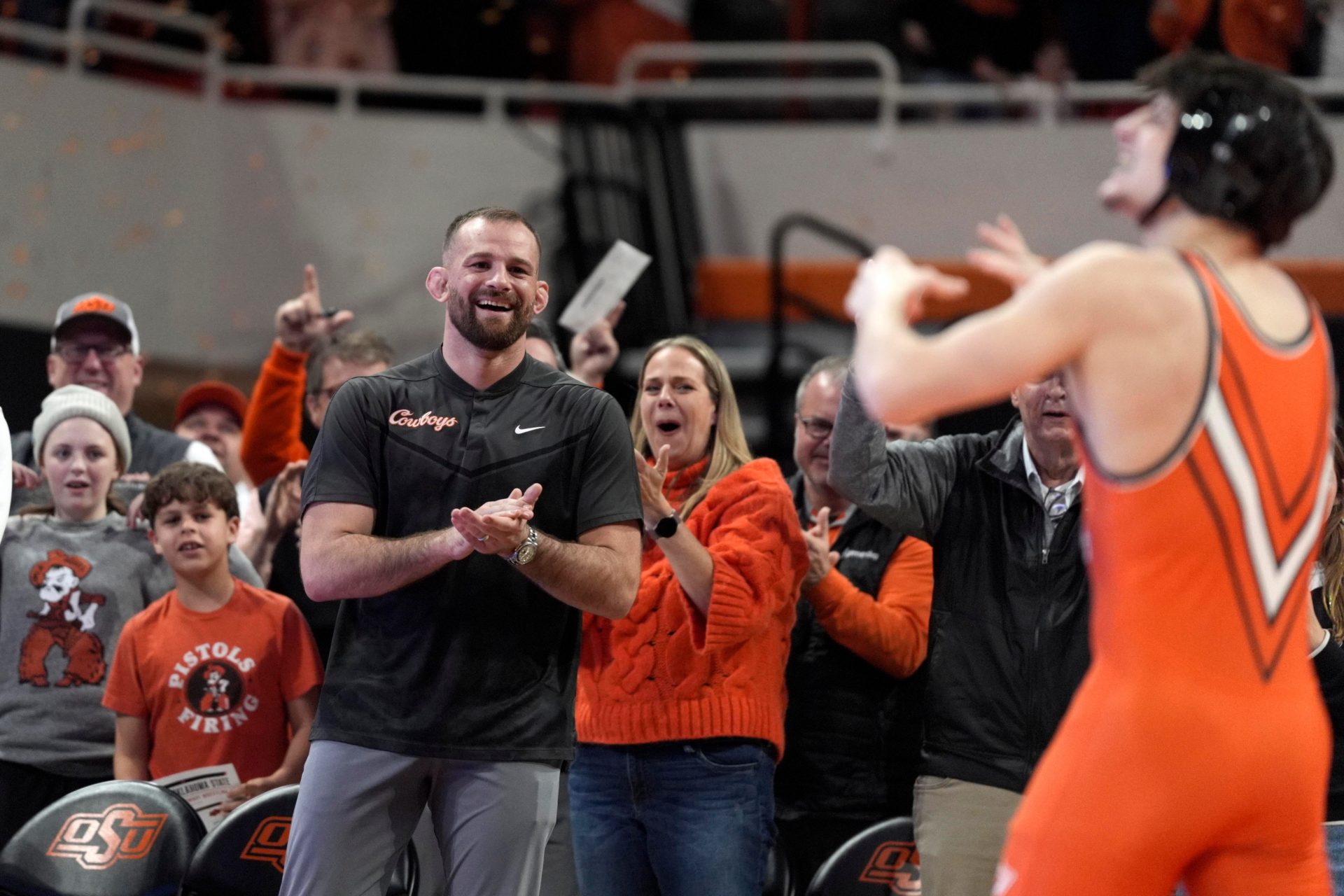 Oklahoma State's coach David Taylor celebrates after Jax Forrest his match at 133 pounds against Oklahoma's Carter Schmidt during a Bedlam wrestling dual between the Oklahoma State Cowboys (OSU) and the University of Oklahoma Sooners (OU) at Gallagher-Iba in Stillwater, Okla., Sunday, Jan. 11, 2026.