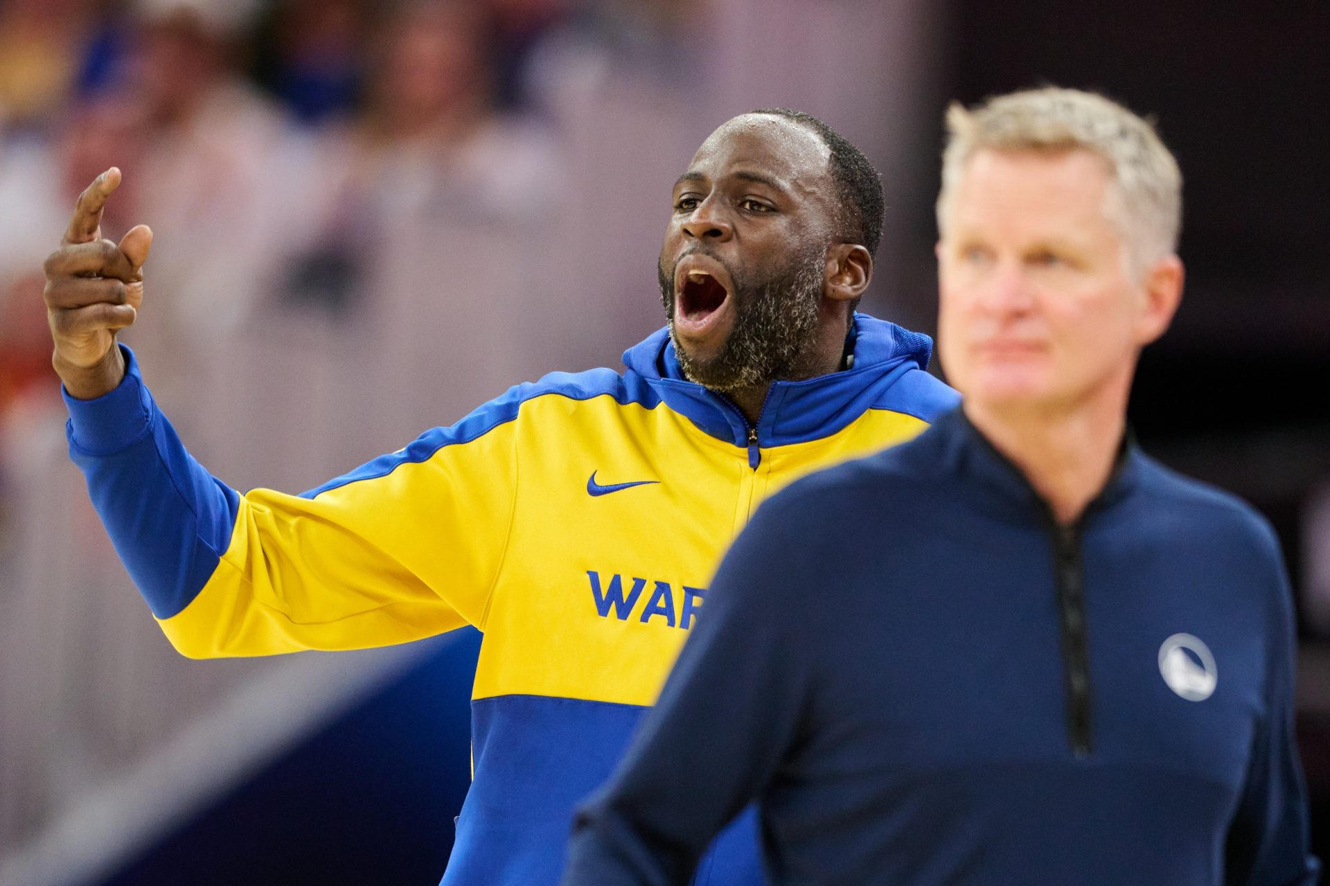Golden State Warriors forward Draymond Green (23) and head coach Steve Kerr react to game play against the Phoenix Suns during the third quarter at Chase Center - Source: Imagn Images