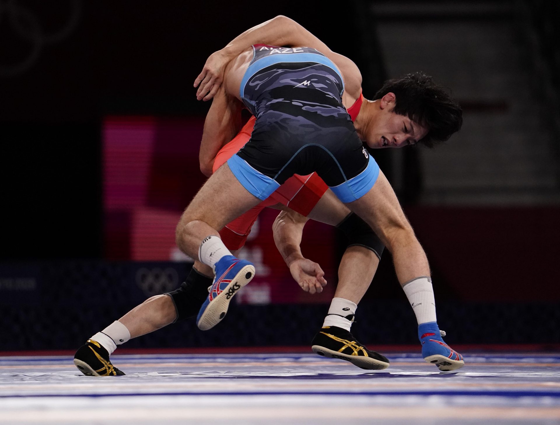 Takuto Otoguro (JPN) competes against Haji Aliyev (AZE) in the men's freestyle 65kg final during the Tokyo 2020 Olympic Summer Games at Makuhari Messe Hall A.