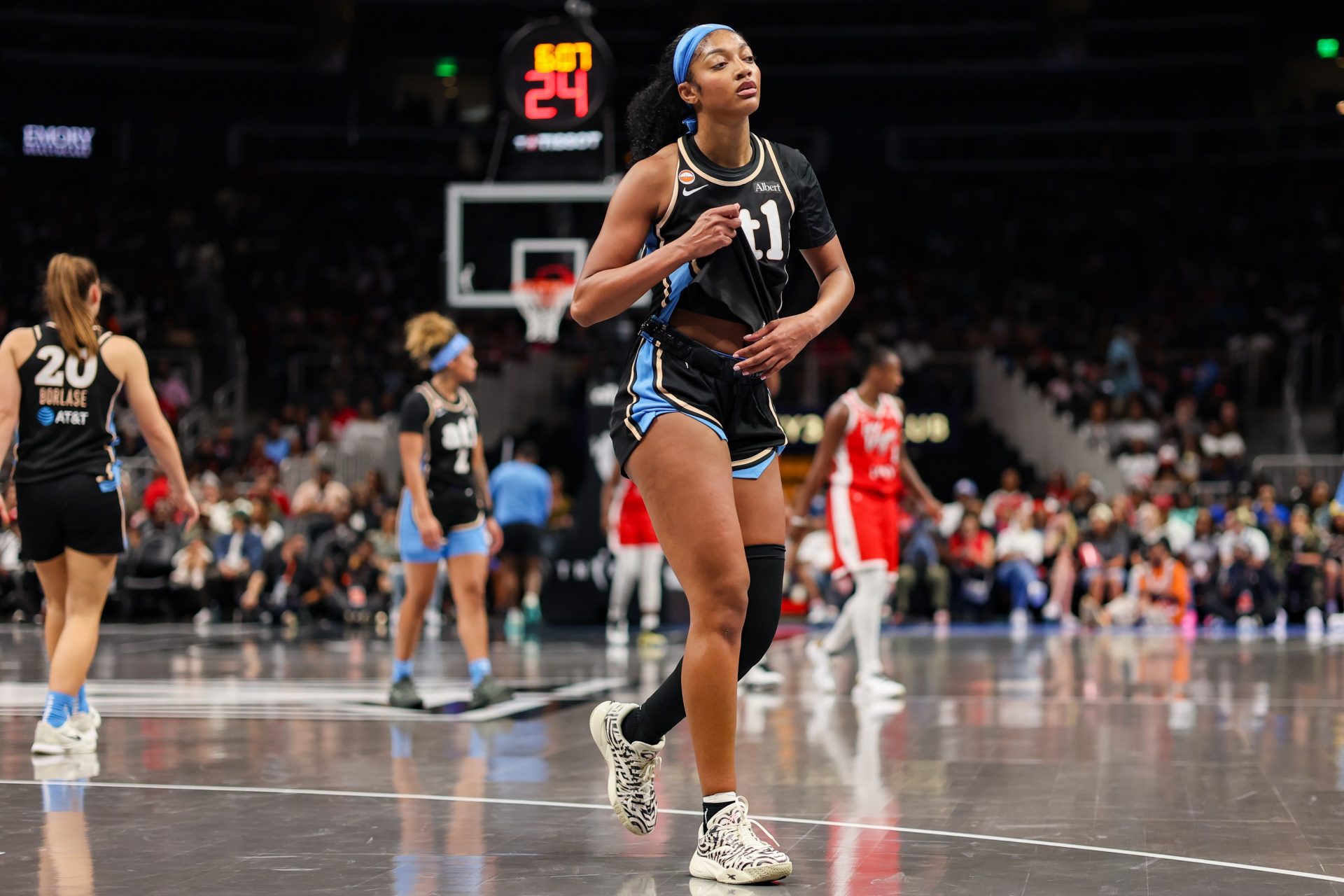 Atlanta Dream forward Angel Reese (5) leaves a game against the Las Vegas Aces in the second quarter at State Farm Arena - Source: Imagn Images