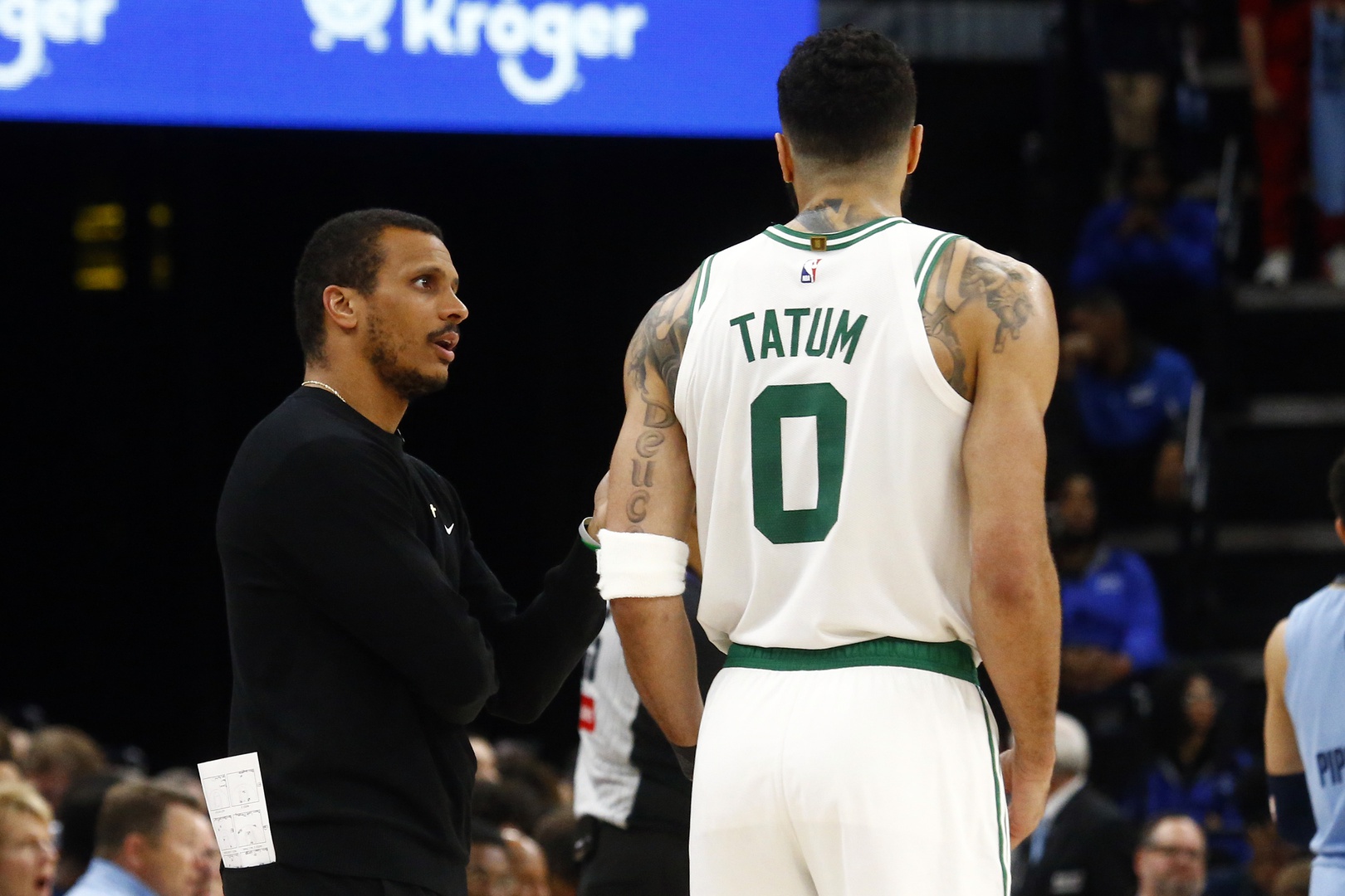 Boston Celtics head coach Joe Mazzulla talks with Boston Celtics forward Jayson Tatum (0) during the fourth quarter against the Memphis Grizzlies at FedExForum.