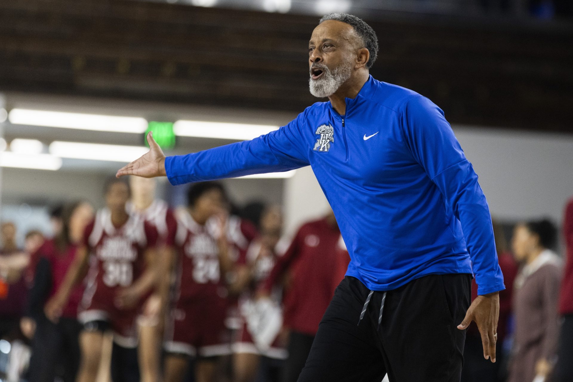 Kentucky Wildcats head coach Kenny Brooks yells at the referee after disagreeing with a call during the fourth quarter at Memorial Coliseum.