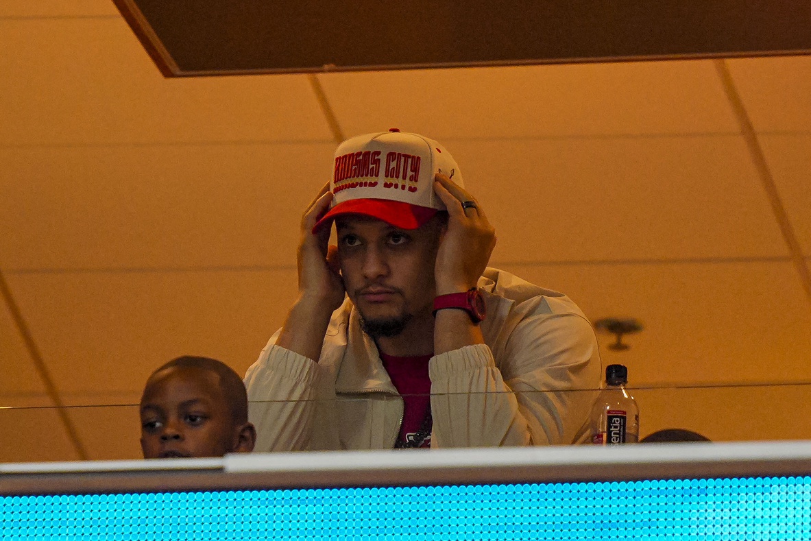 Patrick Mahomes watches the action from a suite during the third quarter at GEHA Field at Arrowhead Stadium.