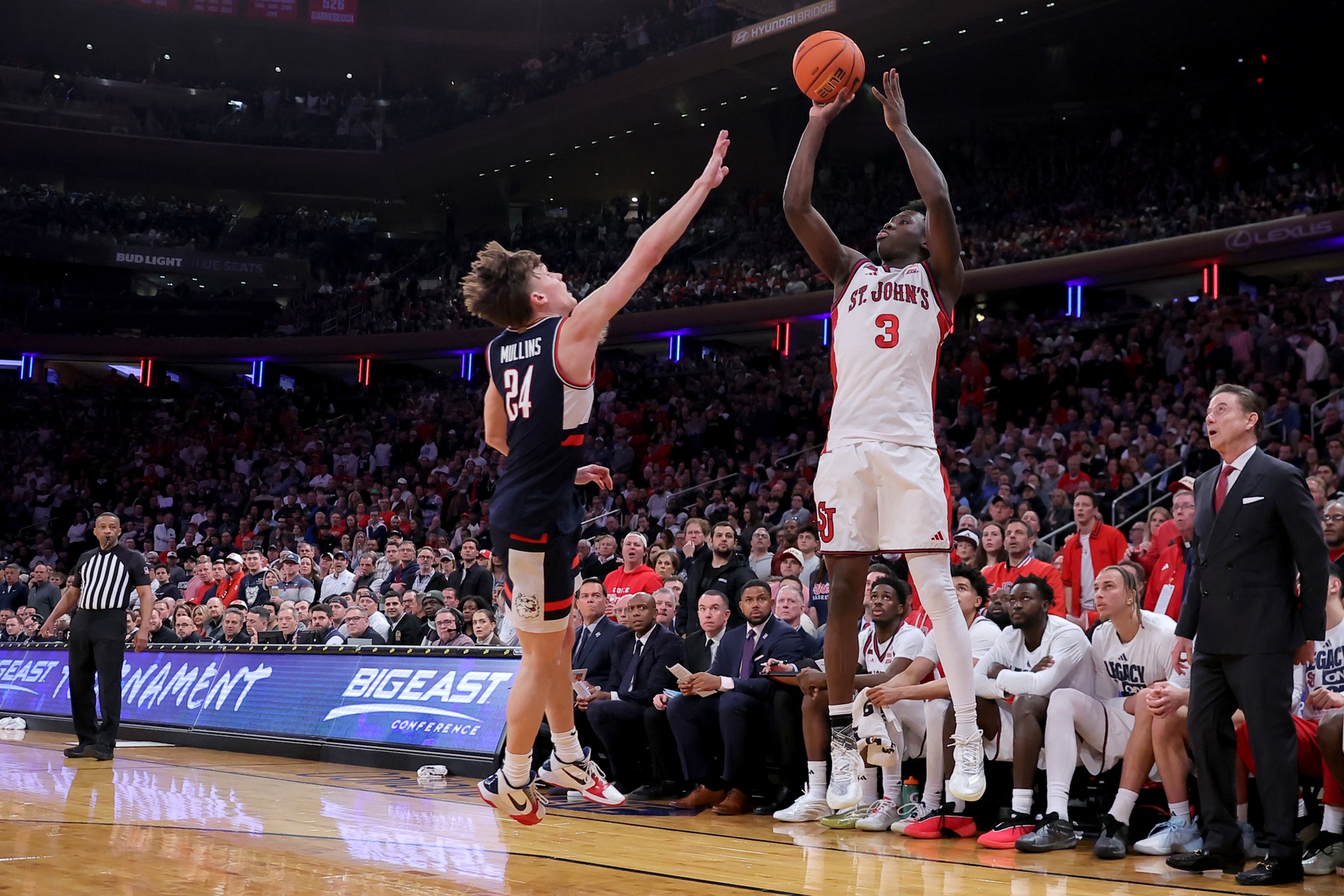 St. John's Red Storm guard Joson Sanon (3) shoots a three point shot against Connecticut Huskies guard Braylon Mullins (24) during the second half of the men's Big East Conference Tournament Championship game at Madison Square Garden. Source: Imagn