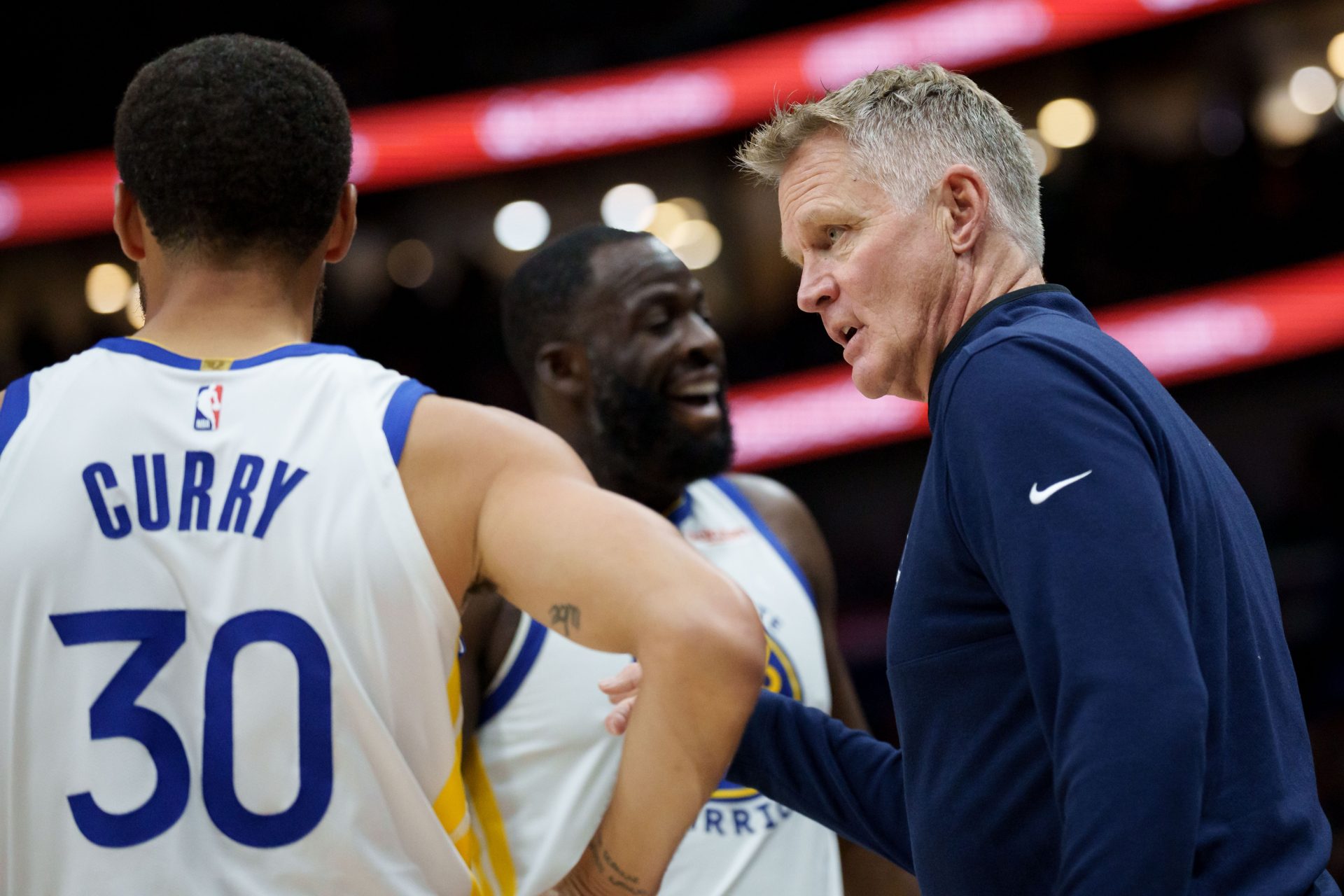 Golden State Warriors head coach Steve Kerr talks to guard Stephen Curry (30) and forward Draymond Green (23) during the first half against the New Orleans Pelicans at Smoothie King Center - Source: Imagn Images