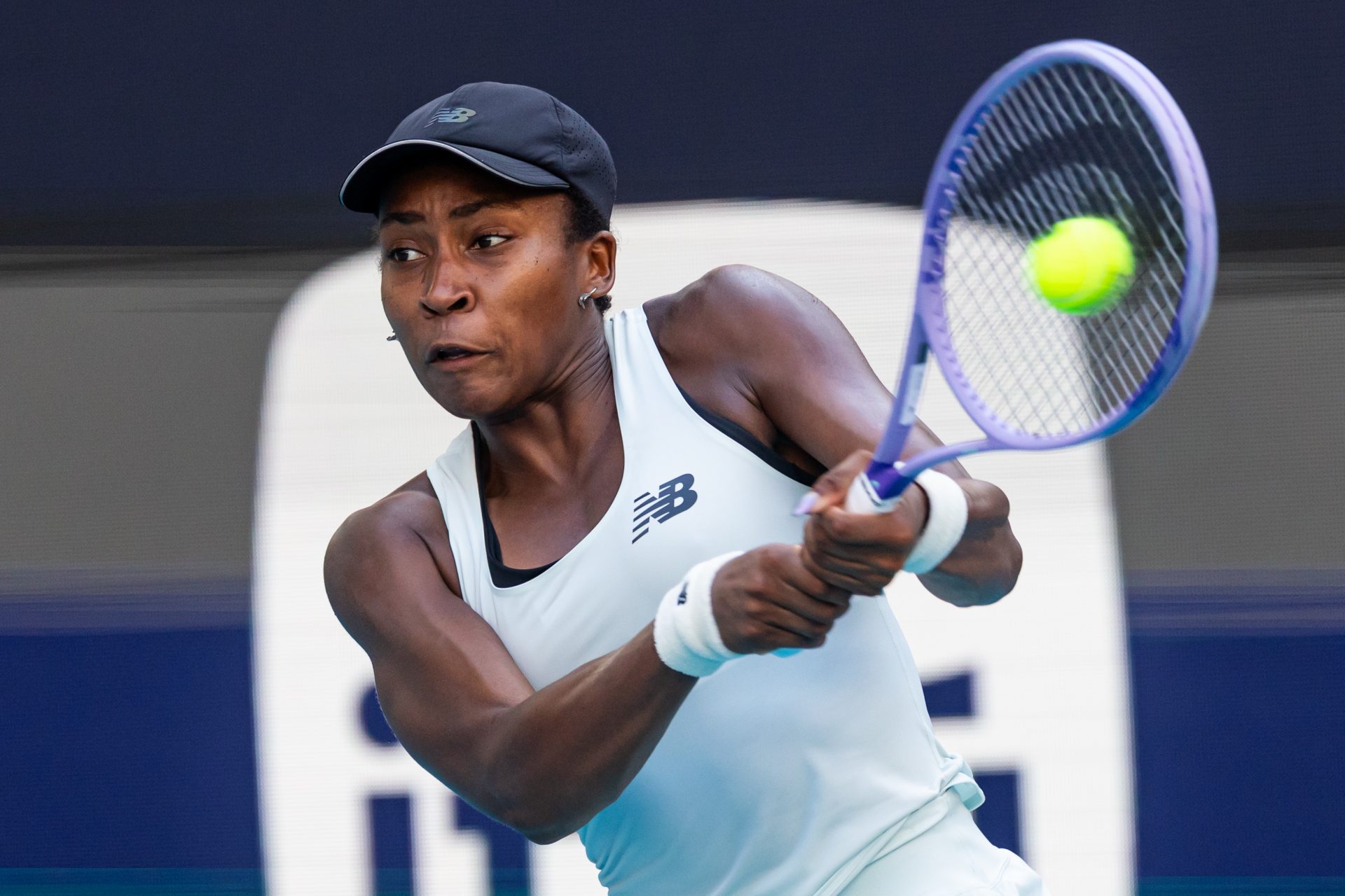 Coco Gauff of the United States hits a backhand against Aryna Sabalenka of Belarus in the final of the women’s singles at the Hard Rock Stadium.