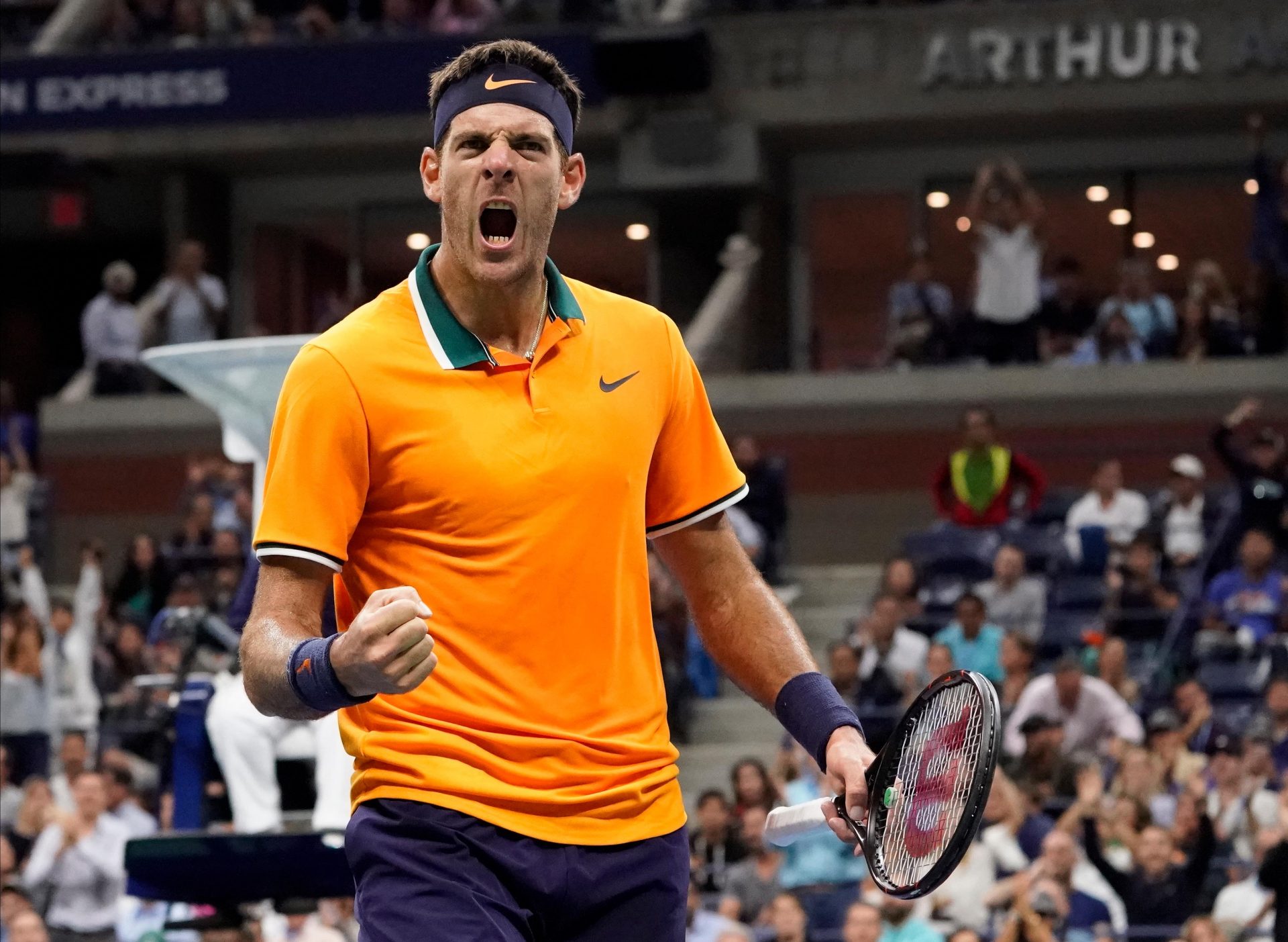 Juan Martin del Potro of Argentina celebrates a winner against Novak Djokovic of Serbia in the 3rd set in the men's final on day fourteen of the 2018 U.S. Open tennis tournament at USTA Billie Jean King National Tennis Center.