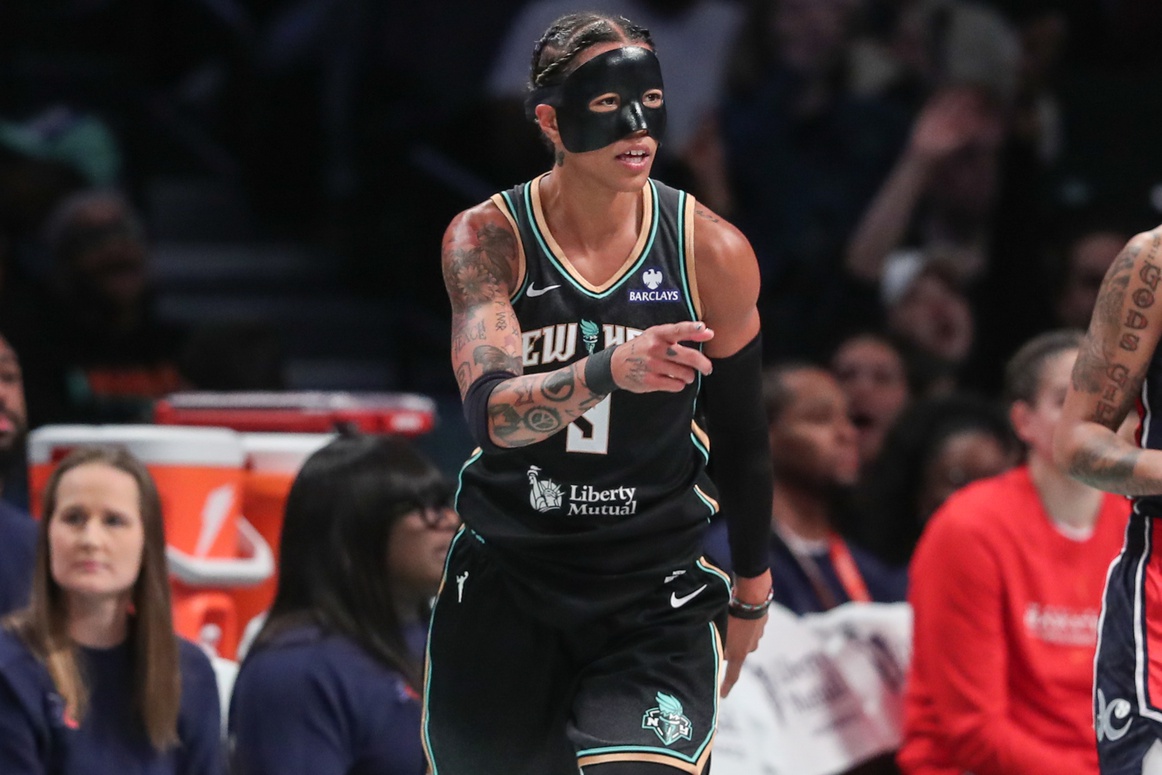 New York Liberty guard Natasha Cloud (9) gestures after scoring in the first quarter against the Washington Mystics at Barclays Center. - Source: Imagn Images