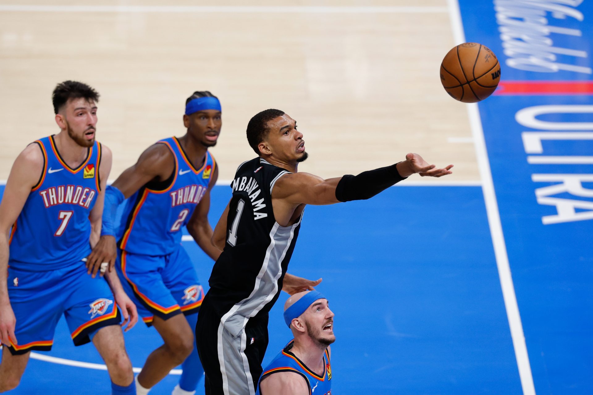 San Antonio Spurs center Victor Wembanyama (1) reaches for a rebound in the fourth quarter against the Oklahoma City Thunder during game one of the western conference finals for the 2026 NBA playoffs at Paycom Center - Source: Imagn Images