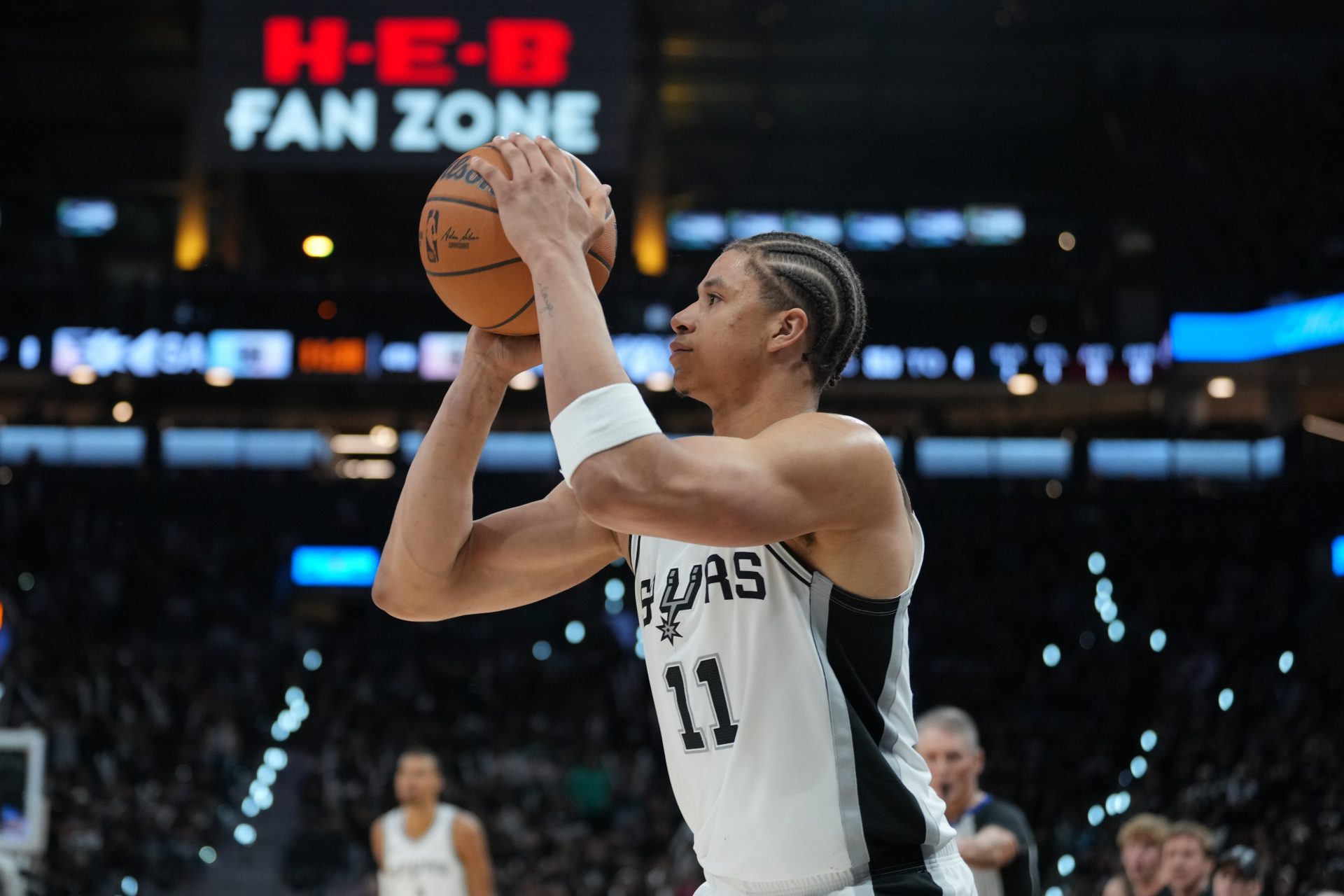 San Antonio Spurs forward Carter Bryant (11) shoots in the second half against the Minnesota Timberwolves during game two of the second round of the 2026 NBA Playoffs at Frost Bank Center - Source: Imagn Images