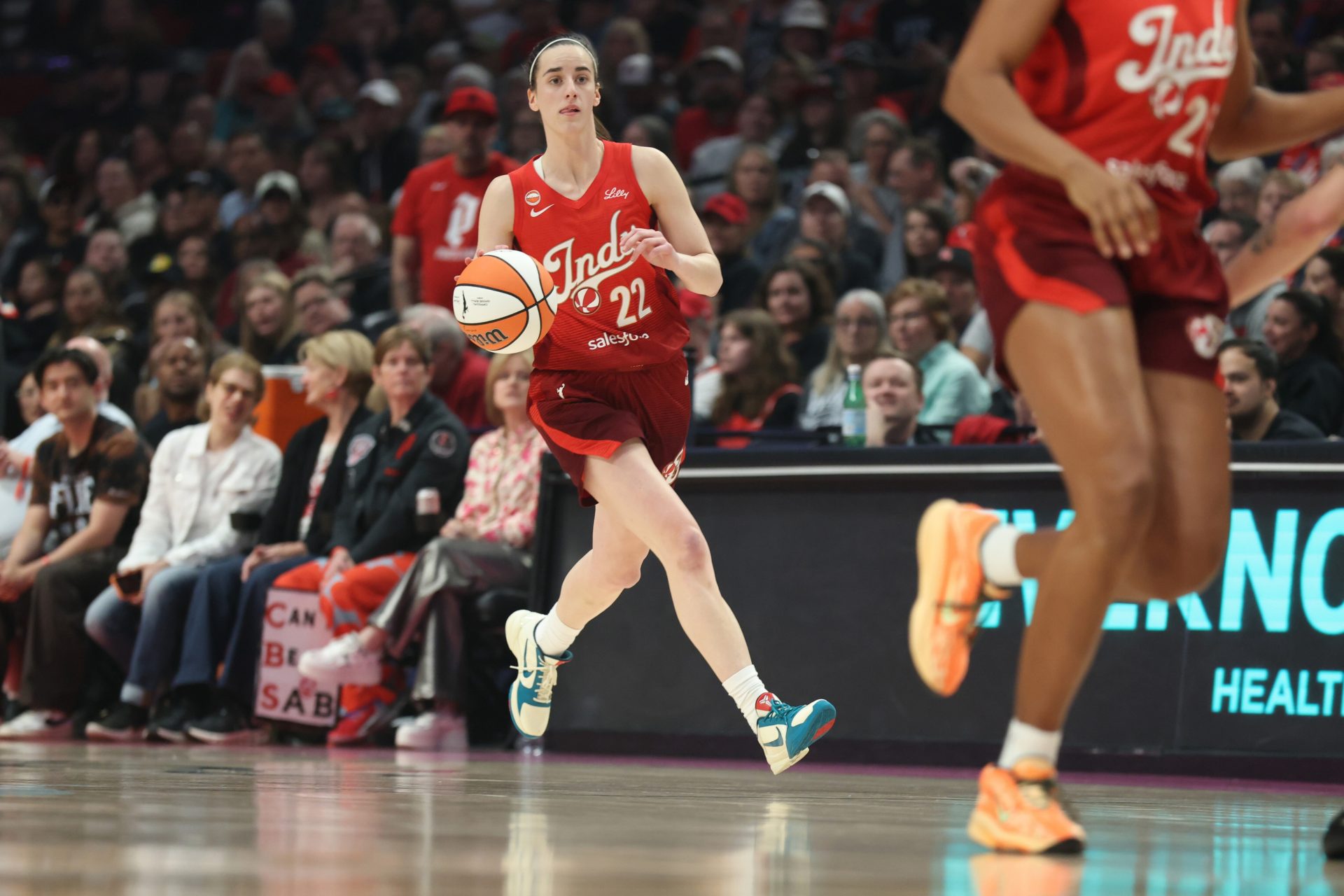 Indiana Fever guard Caitlin Clark (22) brings the ball up the court against the Portland Fire during the first half at Moda Center - Source: Imagn Images