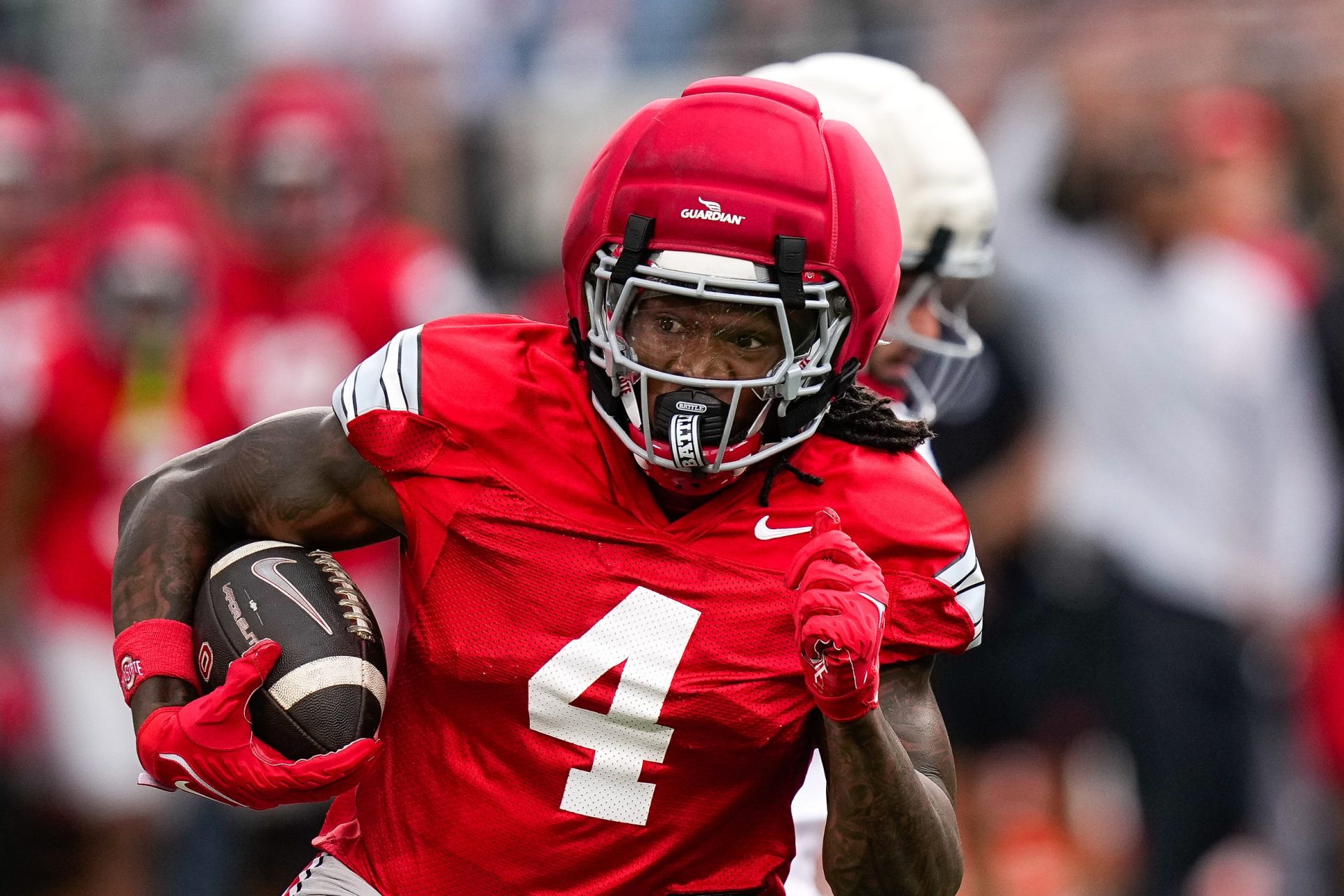Wide receiver Jeremiah Smith (4) runs the ball during the Ohio State football spring game at Ohio Stadium
Source: Imagn