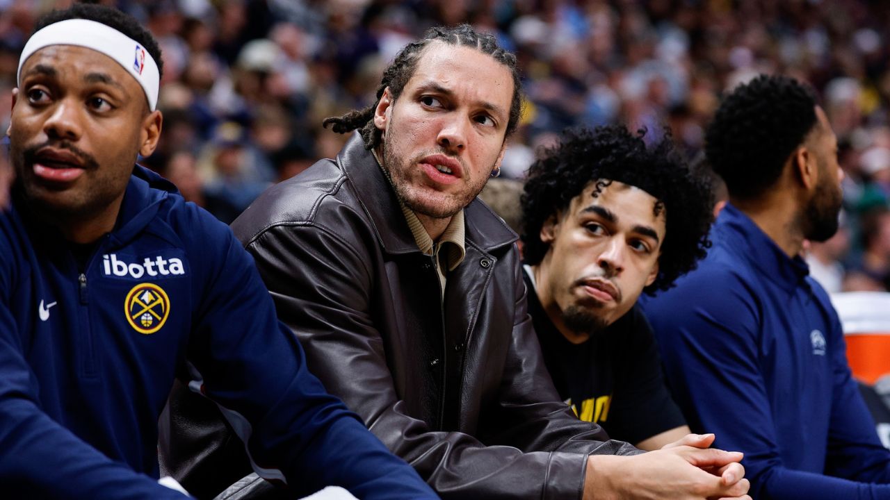 Denver Nuggets forward Aaron Gordon (32) looks on from the bench with guard Bruce Brown (11) and guard Julian Strawther (3) in the first quarter against the Minnesota Timberwolves during game five of the first round of the 2026 NBA Playoffs at Ball Arena - Source: Imagn Images