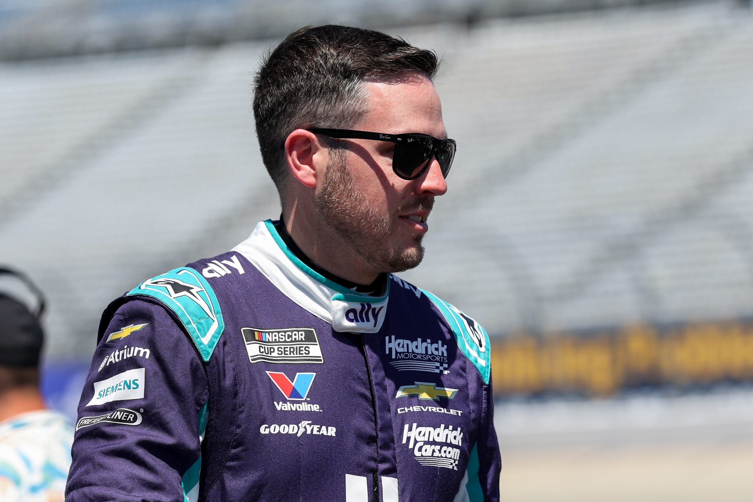 May 16, 2026; Dover, Delaware, USA; NASCAR Cup Series driver Alex Bowman looks on during qualifying for the NASCAR All-Star Race at Dover Motor Speedway. Mandatory Credit: Matthew O'Haren-Imagn Images