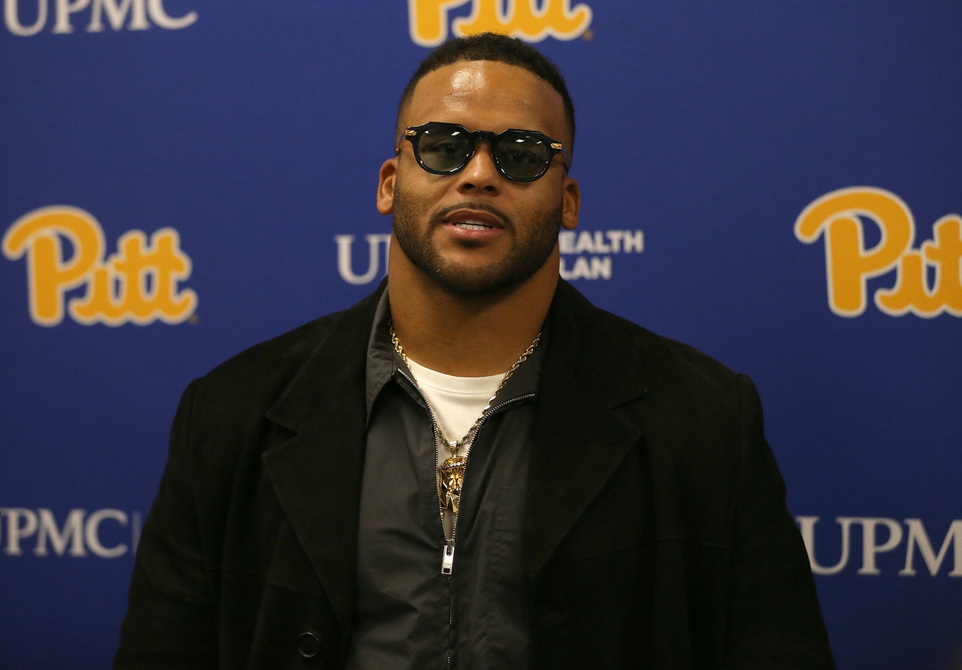 Former Pittsburgh Panther and retired NFL defensive tackle Aaron Donald speaks at a press conference prior to the start of the Pittsburgh Panthers vs Notre Dame Fighting Irish game at Acrisure Stadium in Pittsburgh, PA on November 15, 2025. Credit: Imagn