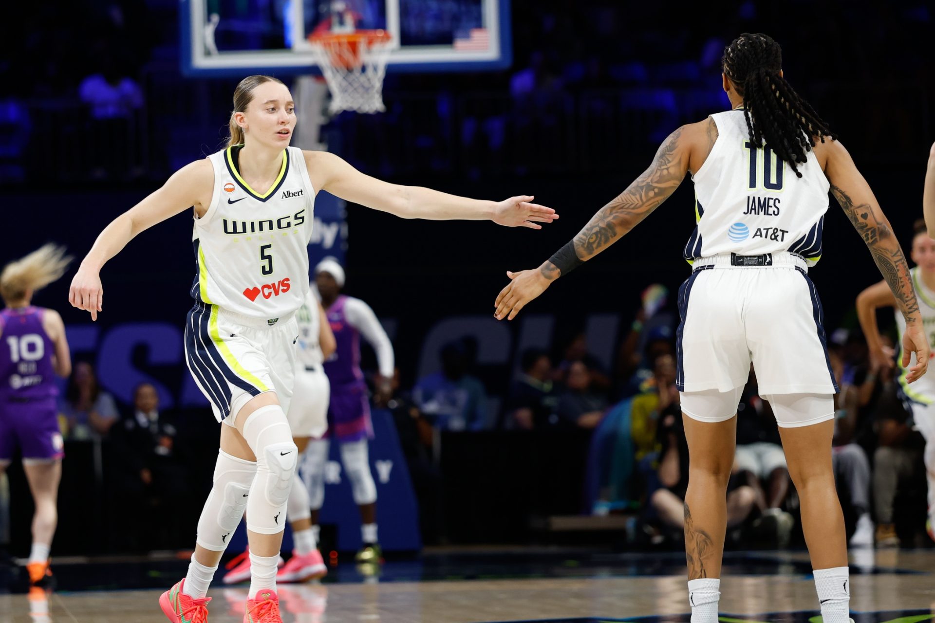 Dallas Wings guard Paige Bueckers (5) and Dallas Wings guard Aziaha James (10) celebrate after a play against the Phoenix Mercury during the second half at College Park Center - Source: Imagn Images