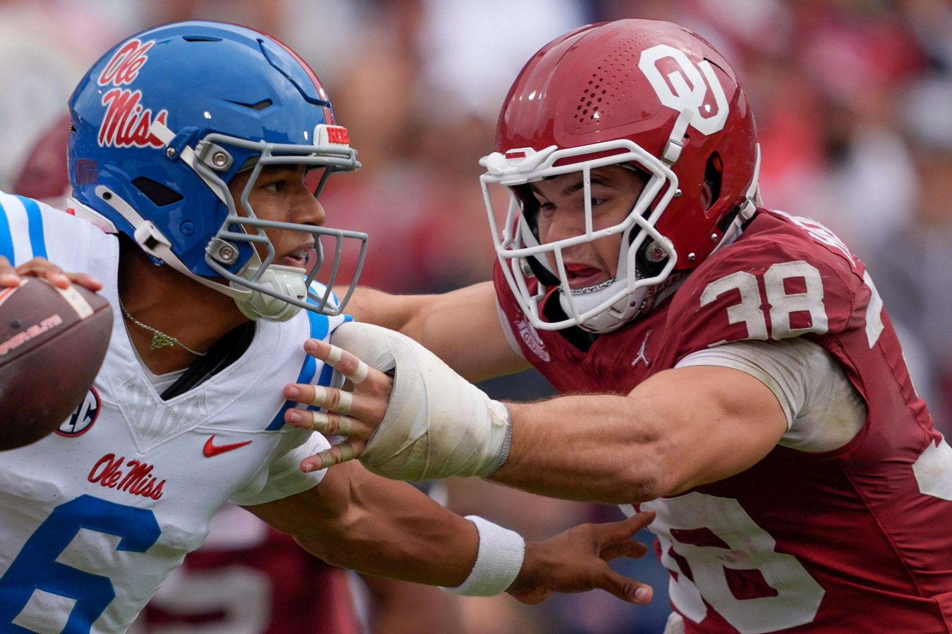 Oklahoma Sooners linebacker Owen Heinecke (38) runs after Ole Miss Rebels quarterback Trinidad Chambliss (6) during a college football game between the University of Oklahoma Sooners (OU) and the Ole Miss Rebels at Gaylord Family-Oklahoma Memorial Stadium in Norman, Okla., Saturday, Oct. 25, 2025. Ole Miss won 34-26. Credit: Imagn