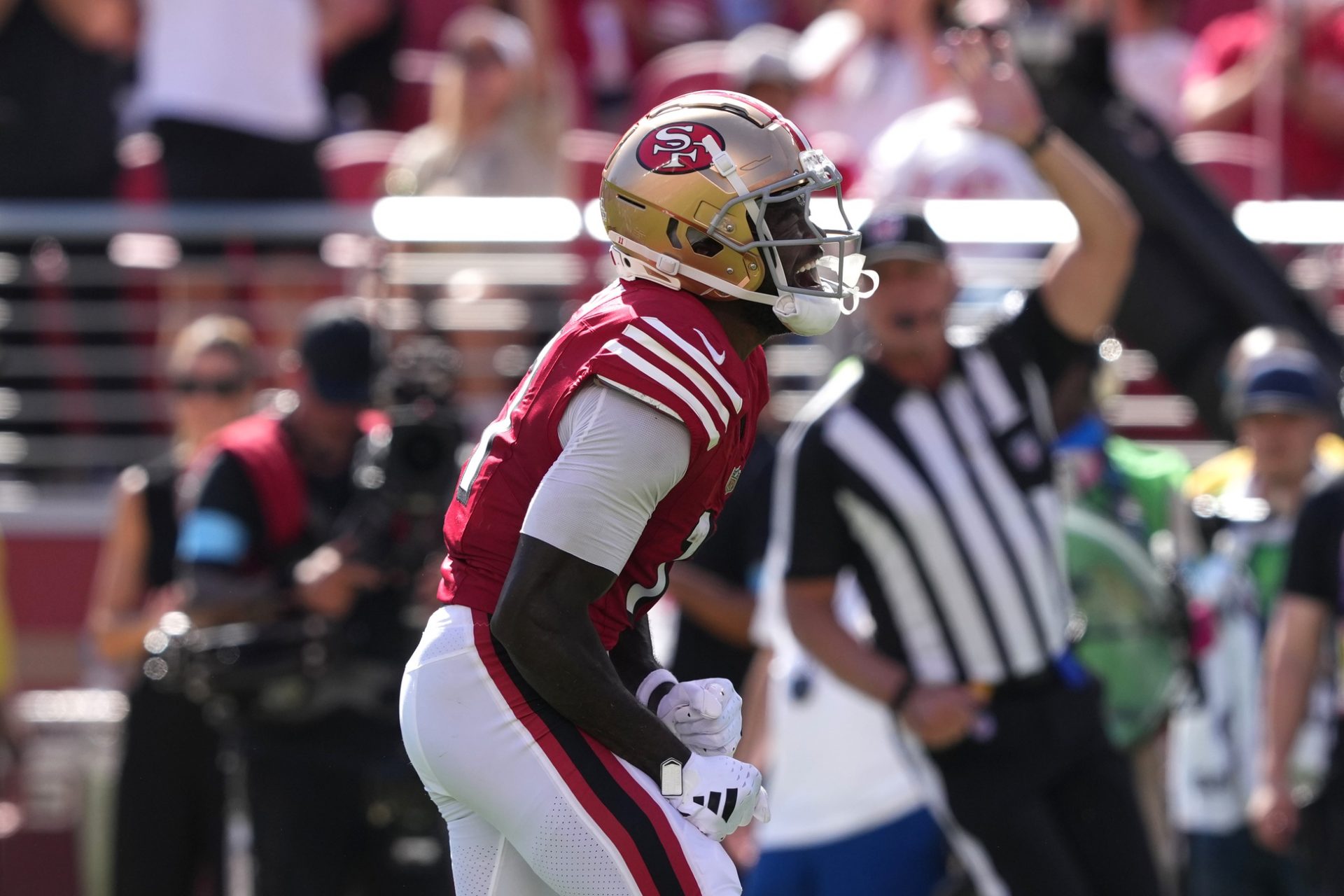 San Francisco 49ers wide receiver Brandon Aiyuk (11) reacts after catching a pass against the Arizona Cardinals during the second quarter at Levi's Stadium.
