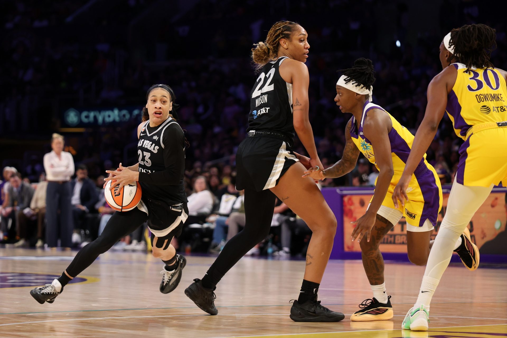 Las Vegas Aces guard Chennedy Carter (23) plays a pick and roll with center A'ja Wilson (22) during the third quarter against the Los Angeles Sparks at Crypto.com Arena.
Source: Imagn