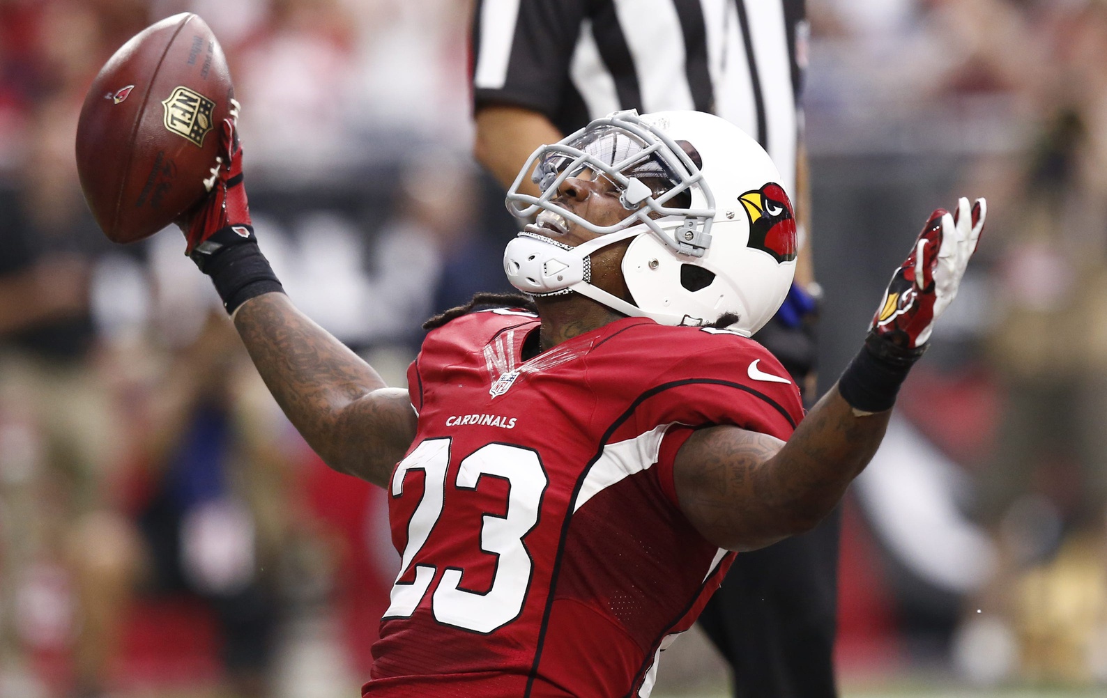 Arizona Cardinals running back Chris Johnson reacts after scoring a touchdown against the San Francisco 49ers in the first half on Sep. 27, 2015, in Glendale, Arizona. Credit: Imagn