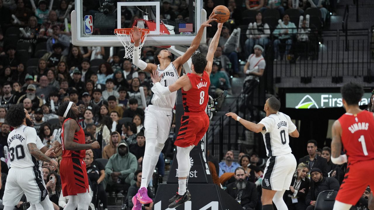 San Antonio Spurs center Victor Wembanyama (1) blocks a shot by Portland Trail Blazers forward Deni Avdija (8) in the second half at Frost Bank Center - Source: Imagn Images