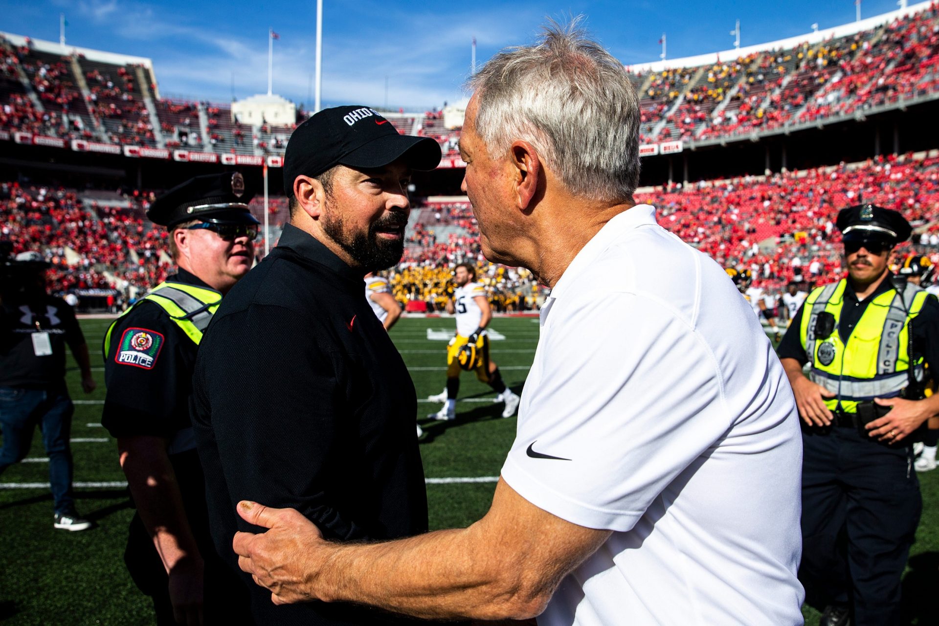 Ohio State head coach Ryan Day, left, shakes hands with Iowa head coach Kirk Ferentz after a NCAA football game, Saturday, Oct. 22, 2022, at Ohio Stadium in Columbus, Ohio. Credit: Imagn