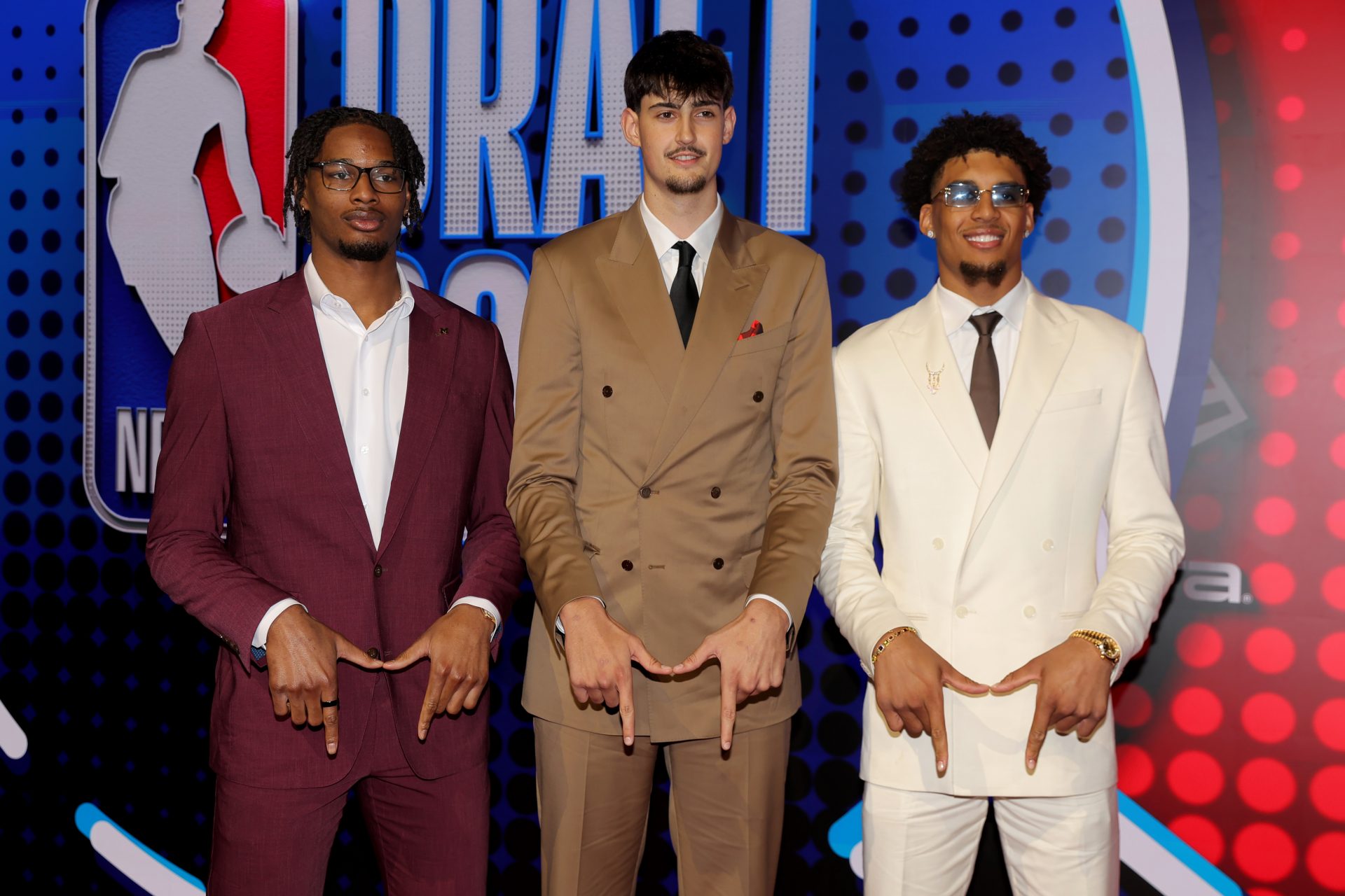 Draft prospects Morez Johnson Jr. (left to right) Aday Mara and Yaxel Lendeborg pose for photos on the red carpet before the 2026 NBA draft at Barclays Center.
