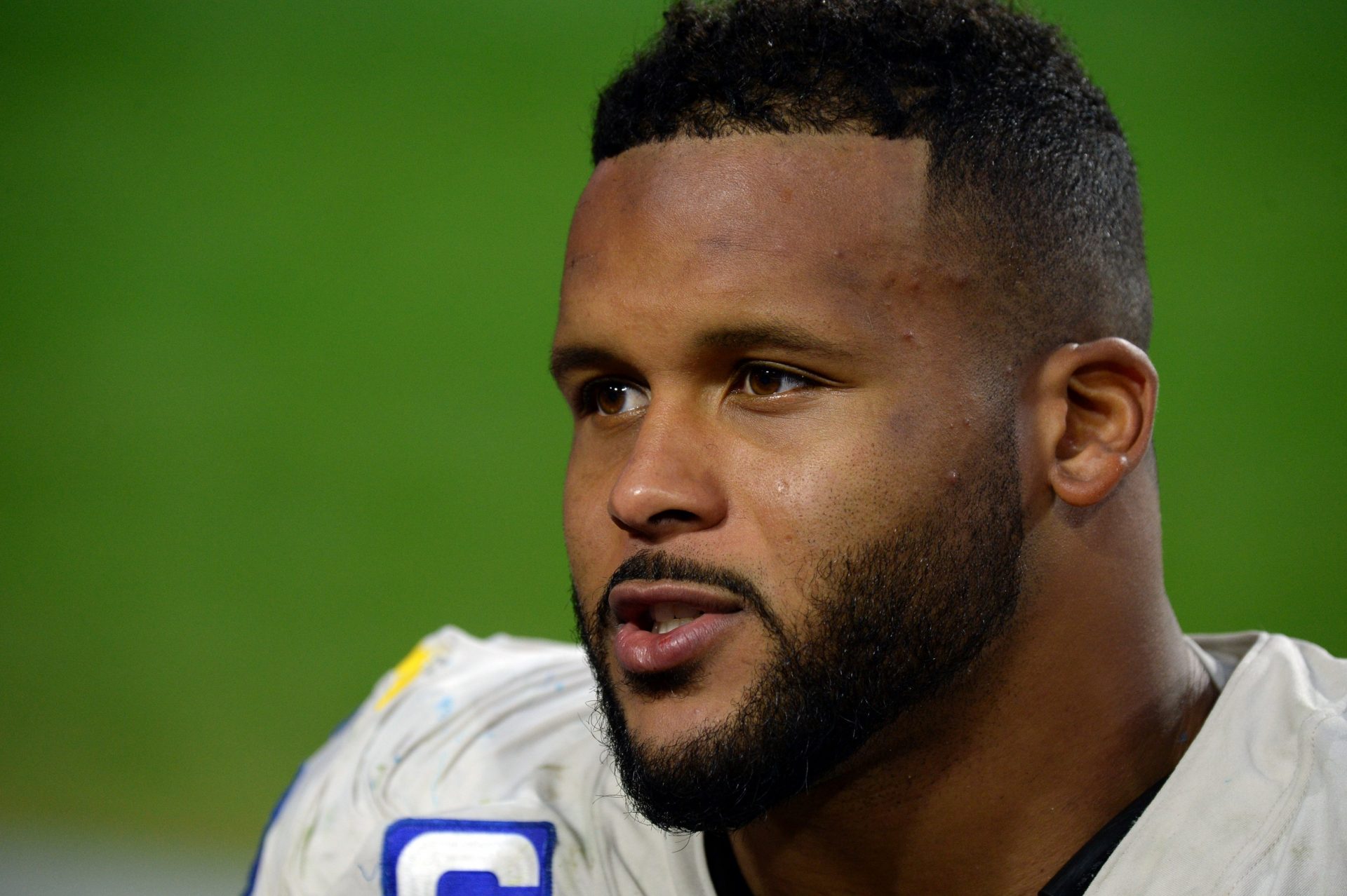 Los Angeles Rams defensive end Aaron Donald (99) is interviewed after the game against the Arizona Cardinals at State Farm Stadium.
