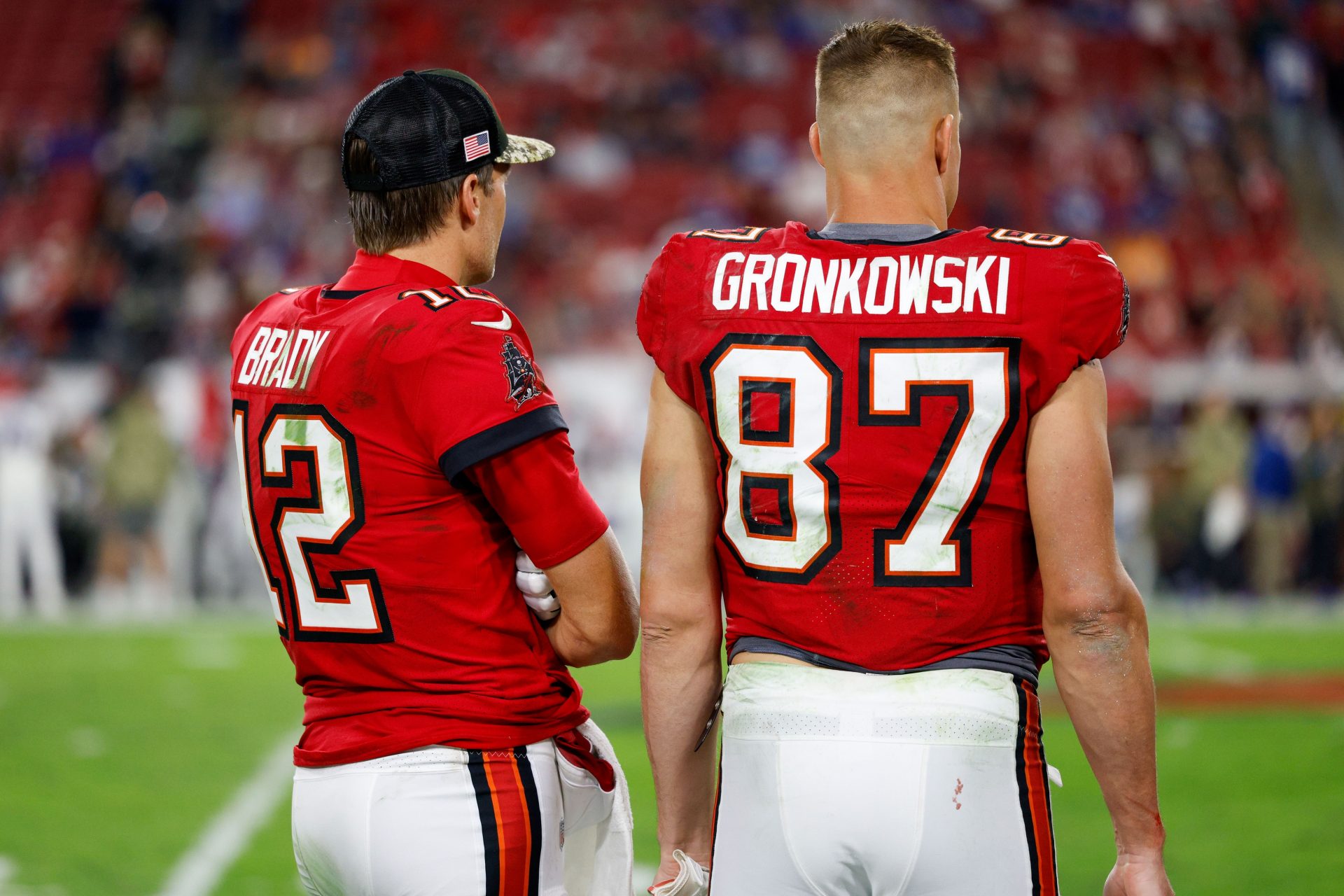 Tampa Bay Buccaneers quarterback Tom Brady (12) and tight end Rob Gronkowski (87) look on in the second half against the New York Giants  at Raymond James Stadium.