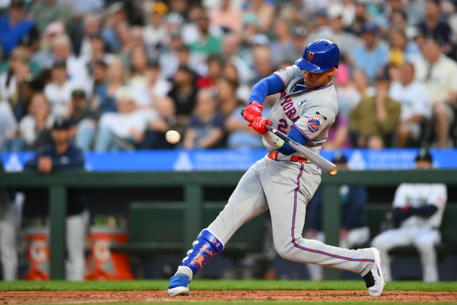 New York Mets left fielder Juan Soto (22) hits a single against the Seattle Mariners during the sixth inning at T-Mobile Park.