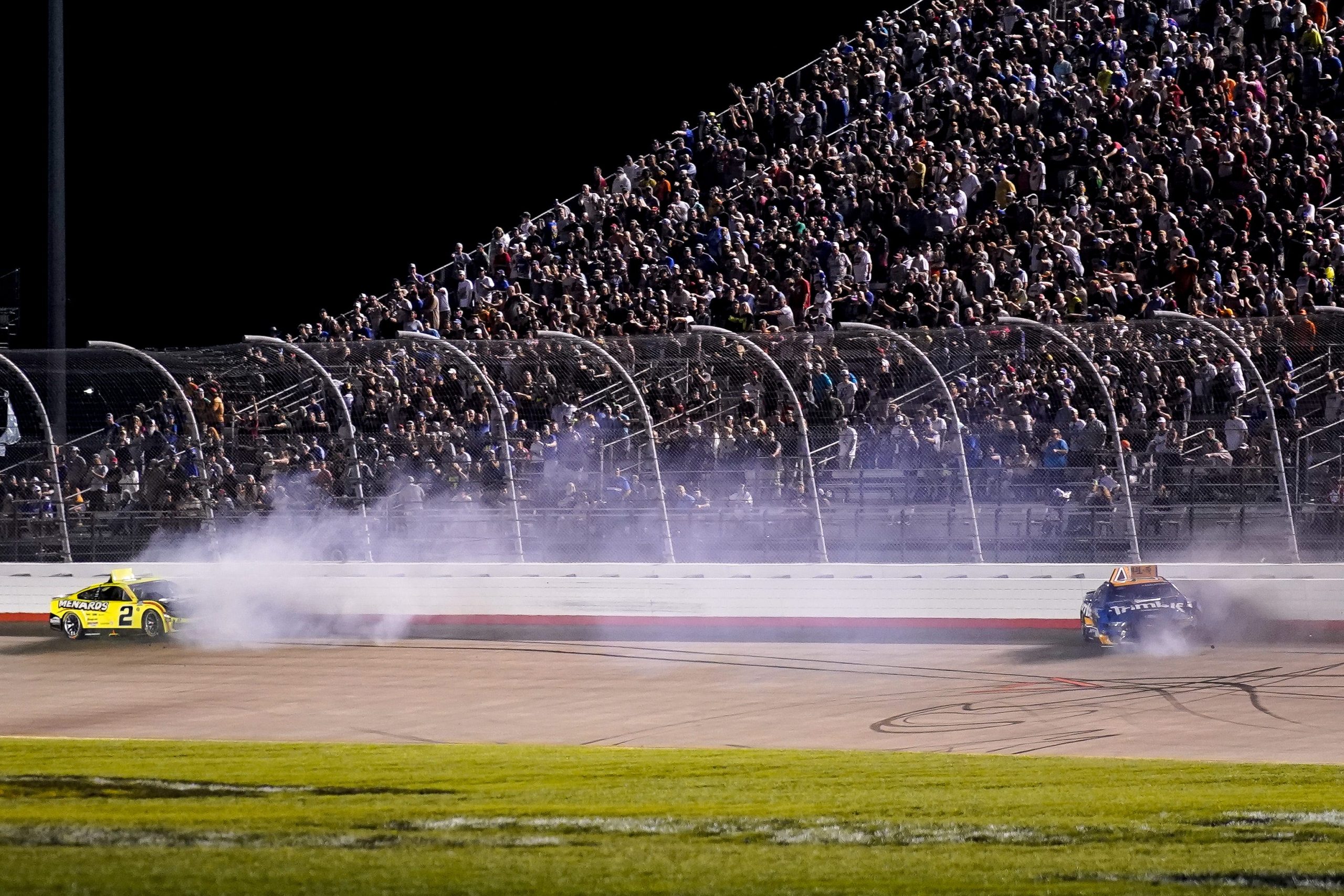 Austin Cindric and Brad Keselowski after Austin Dillon hit the back of No.6 Ford 