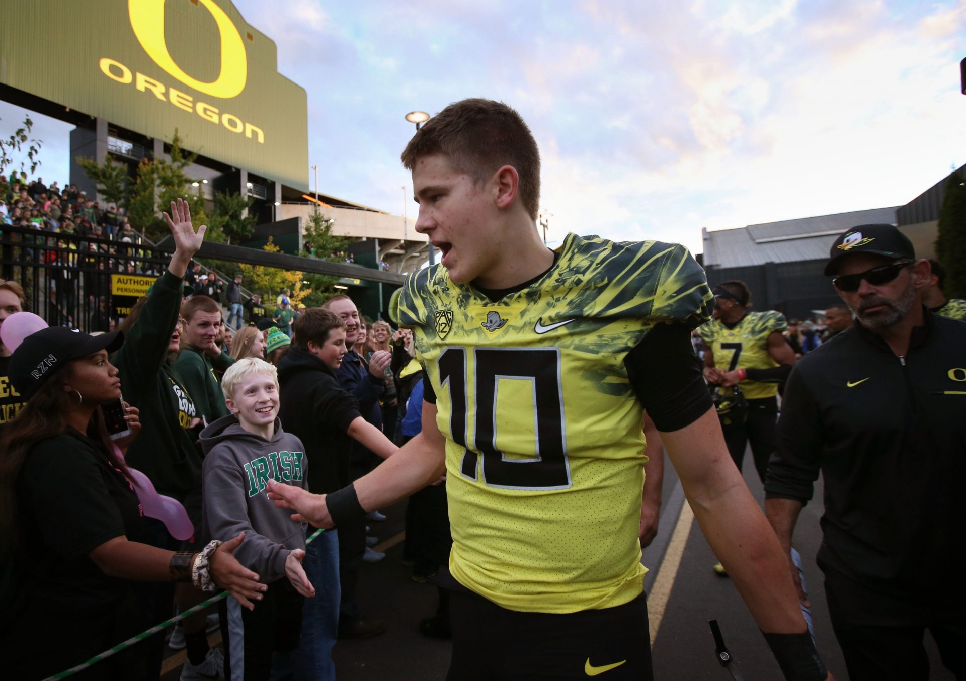 Oregon's Justin Herbert celebrates with fans at Autzen Stadium after a win over Arizona State in 2016. From Eugene, Herbert lead the Oregon Ducks to a Pac-12 Championship in 2019. He now plays for the Los Angeles Chargers. Credit: Imagn