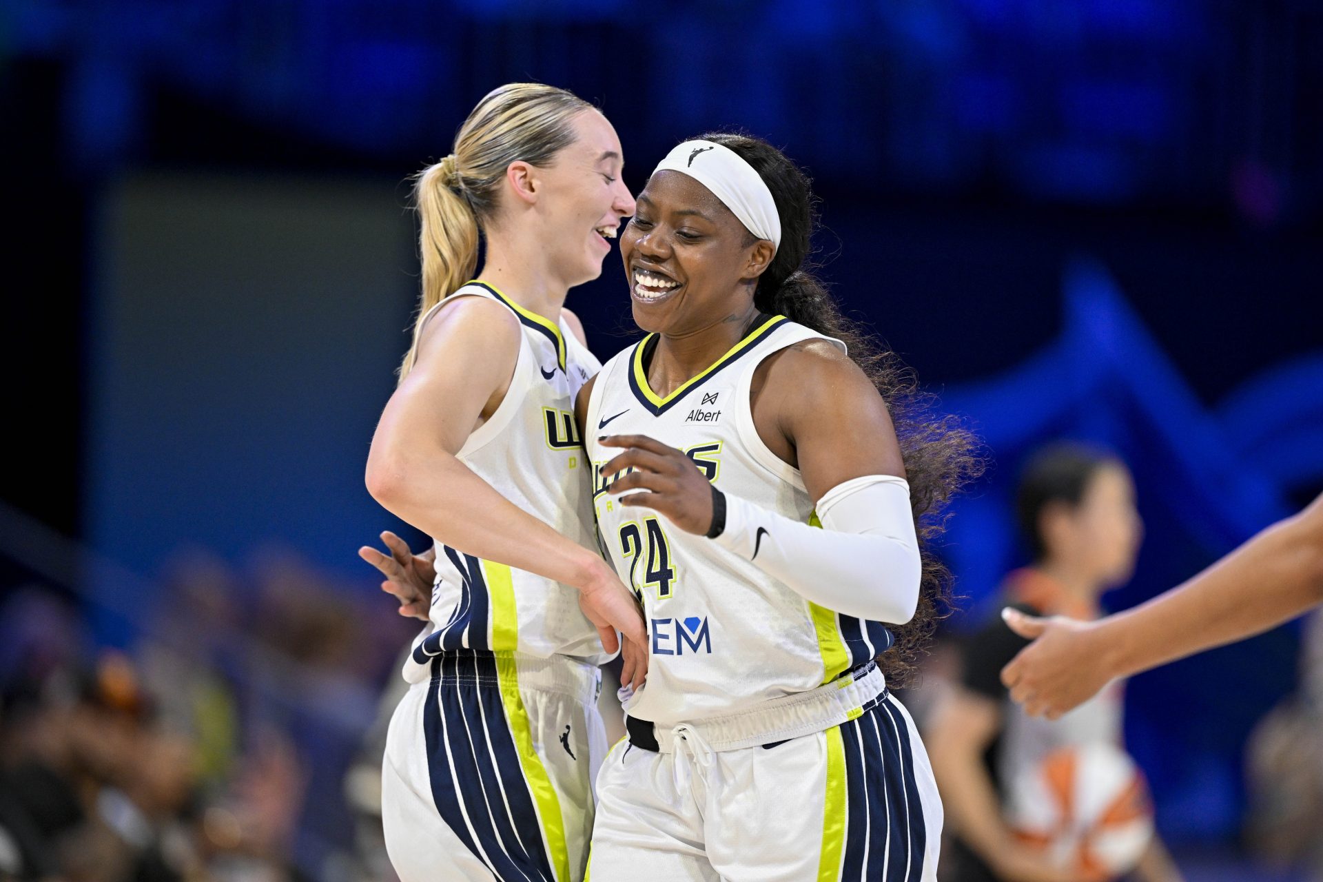 Dallas Wings guard Paige Bueckers (5) and guard Arike Ogunbowale (24) celebrate during the game between the Dallas Wings and the New York Liberty at College Park Center - Source: Imagn Images