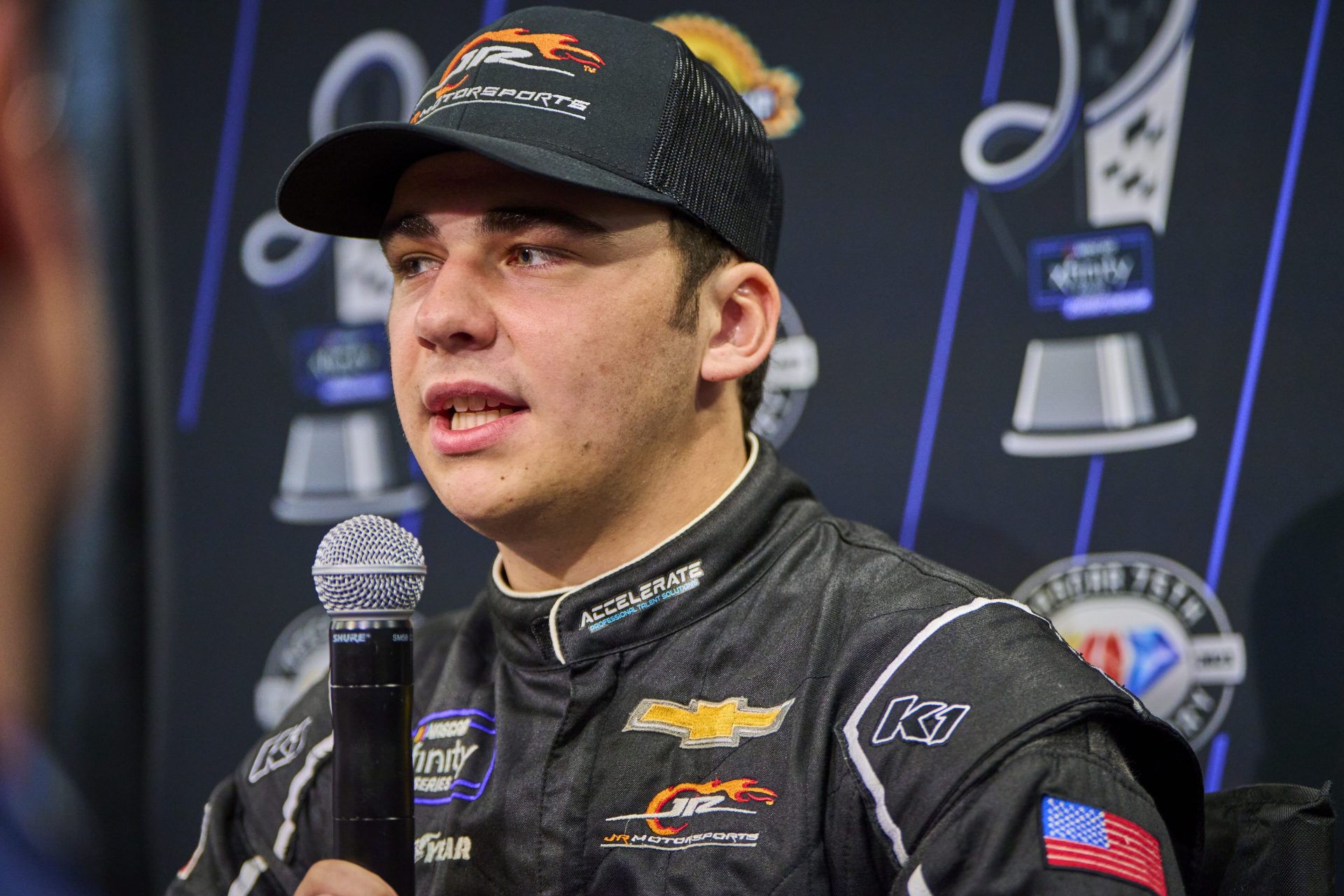 Sam Mayer speaks to the media during NASCAR media day