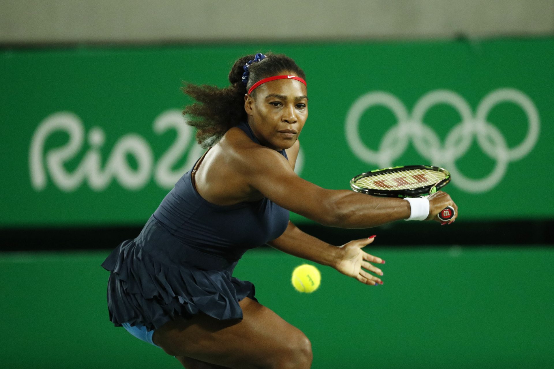 Serena Williams (USA) hits a backhand to Alize Cornet (FRA, not pictured) during the women's singles in the Rio 2016 Summer Olympic Games at Olympic Tennis Centre.