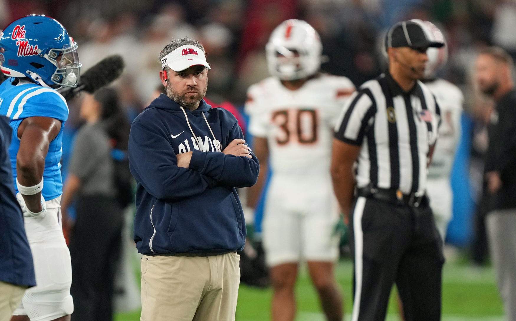Ole Miss head coach Pete Golding stands on the field during warmups before the CFP Fiesta Bowl at the State Farm Stadium, in Glendale, Ariz., on Thursday, Jan. 8, 2026. Credit: Imagn