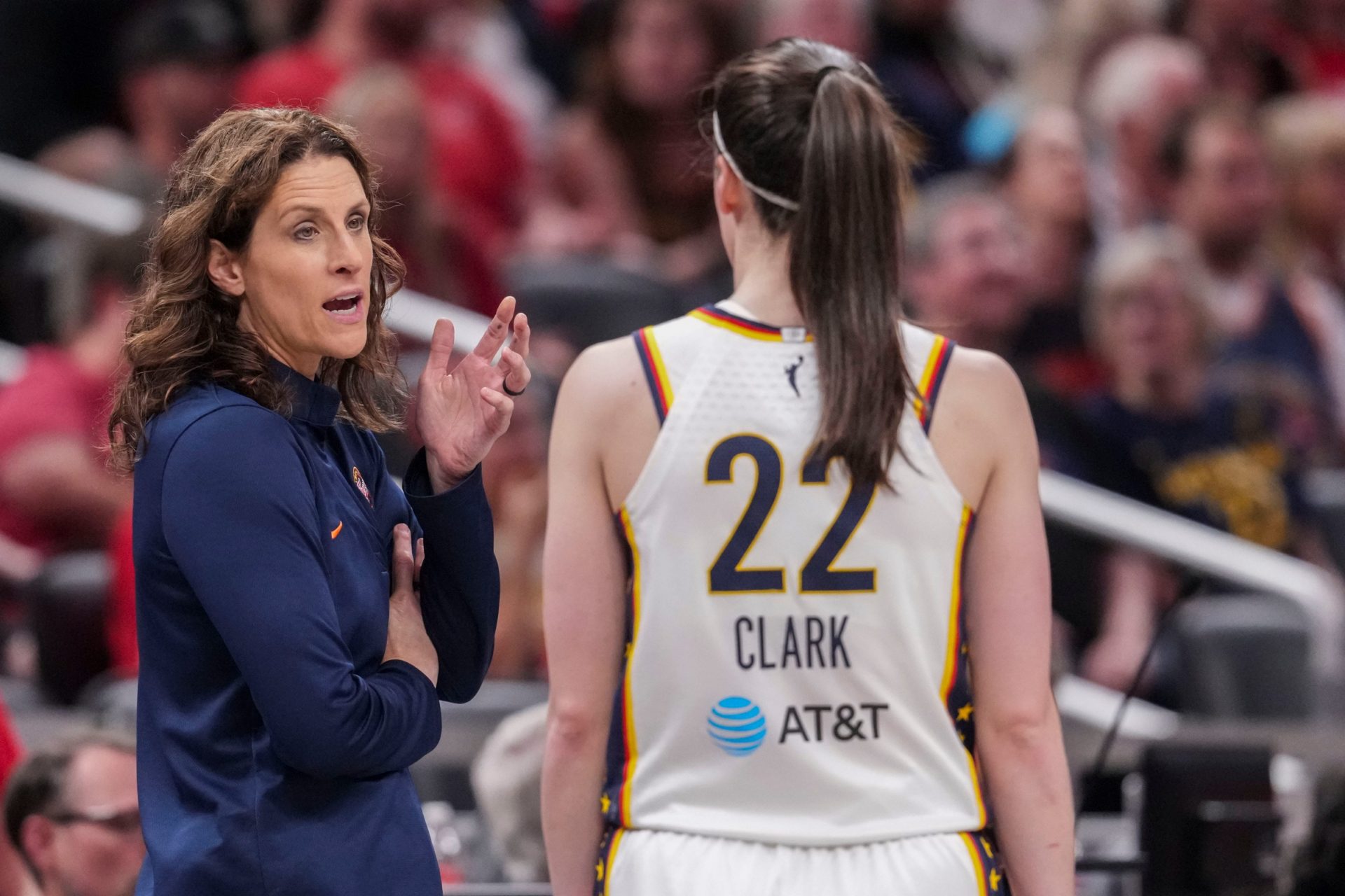 Indiana Fever head coach Stephanie White talks with Indiana Fever guard Caitlin Clark (22) on Wednesday, June 24, 2026, during the first half of a game at Gainbridge Fieldhouse in Indianapolis. The Phoenix Mercury defeated the Indiana Fever, 111-109. Credit: Imagn