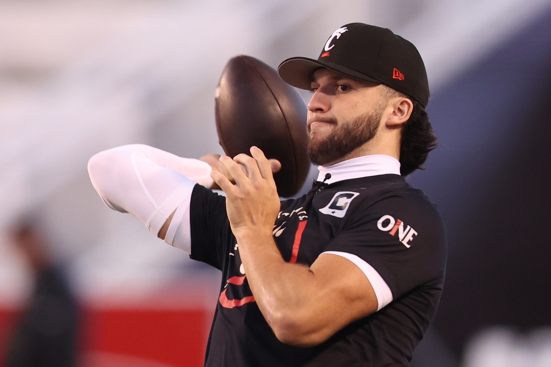 Cincinnati Bearcats quarterback Brendan Sorsby (2) warms up before the game against the Utah Utes at Rice-Eccles Stadium.
