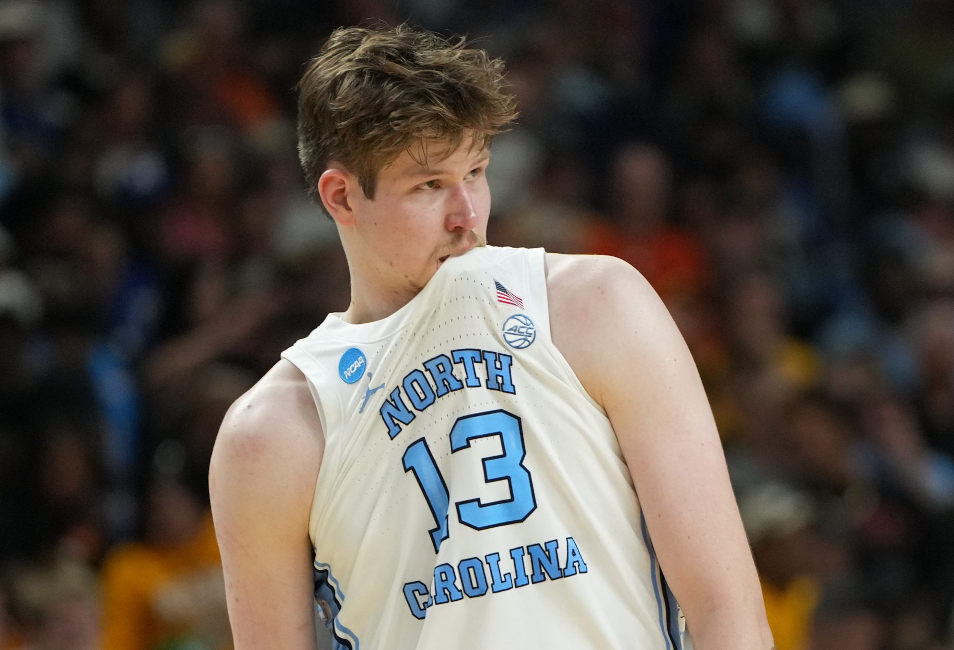 North Carolina Tar Heels center Henri Veesaar (13) bites his jersey against the VCU Rams in the second half of a first round game of the men's 2026 NCAA Tournament at Bon Secours Wellness Arena.