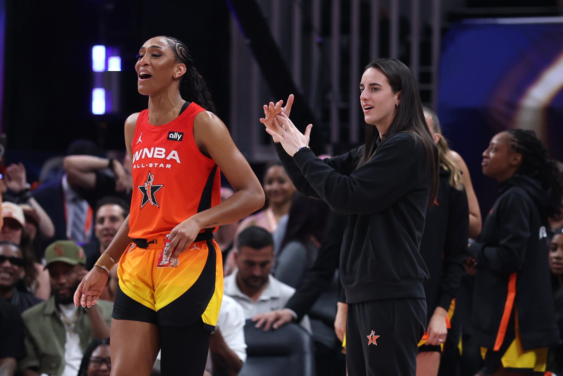 Team Clark guard Caitlin Clark (22) and center A'ja Wilson (22) react on the bench in the fourth quarter against Team Collier the 2025 WNBA All Star Game at Gainbridge Fieldhouse.